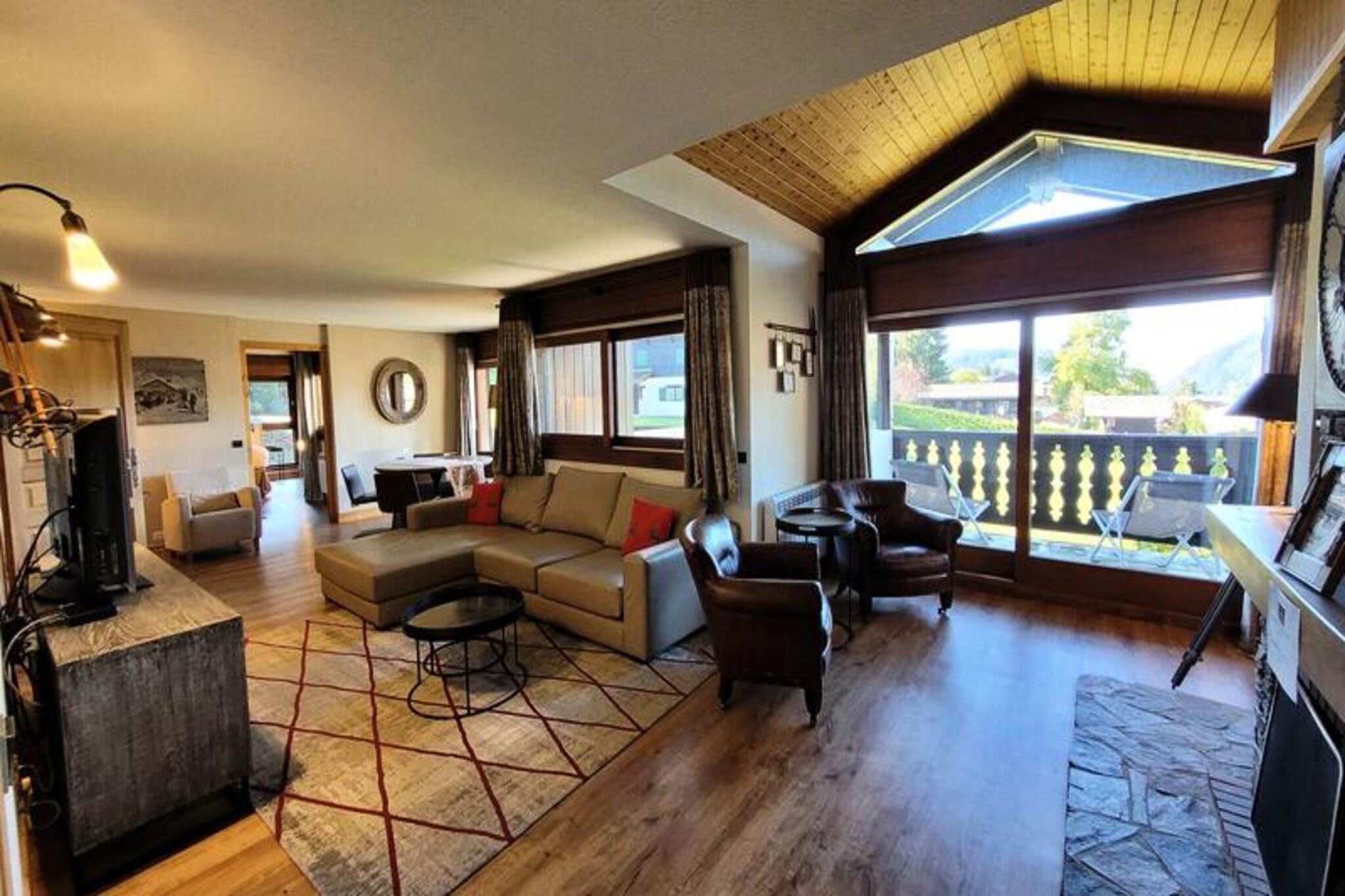 Imagine waking up to the serene beauty of the French Alps, where the crisp mountain air greets you and the slopes of Chavannes lie just outside your door. This exceptional 198 m² apartment, located at the foot of the ski slopes, offers the ultimate ski-in/ski-out experience, combining alpine charm with modern luxury. Nestled in the heart of the village, this residence is a peaceful retreat while being just steps away from shops, restaurants, and all the amenities you could need for a perfect mountain escape. 
 
 Step inside and discover a bright and spacious living area, bathed in natural light thanks to its East-Southwest exposure. The apartment is thoughtfully designed to accommodate up to 10 guests, featuring four en-suite bedrooms, each with its own bathroom, ensuring both comfort and privacy. The fully equipped kitchen opens onto a welcoming dining area, perfect for sharing meals after a day on the slopes. Eight balconies provide breathtaking panoramic views of the resort and surrounding peaks, inviting you to savor every moment of your alpine getaway. 
 
 The location is unparalleled, with the ski slopes literally at your doorstep and the vibrant village center just 50 meters away. The French Ski School (ESF) is a short 280-meter stroll, and essential services like a doctor’s office are within easy reach. Whether you’re skiing in winter or exploring mountain trails in summer, this apartment is the ideal base for unforgettable adventures. 
 
 With its blend of tranquility, convenience, and luxurious amenities, this property promises a holiday experience like no other. From the cozy interiors to the stunning outdoor vistas, every detail has been designed to create lasting memories in the heart of the Alps.