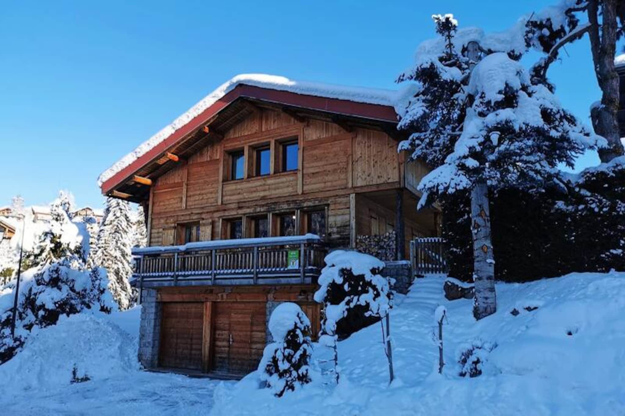 In the serene La Turche area of Les Gets, Chalet l'Hermine offers a tranquil escape surrounded by alpine beauty. This detached 4-star chalet boasts a private garden where children can play freely and adults can unwind amidst the breathtaking mountain scenery. With southwest exposure, the chalet is bathed in natural light throughout the day, creating a warm and inviting atmosphere for your stay. Just a short 5-minute walk from the La Turche ski slopes, it’s perfectly positioned for winter sports enthusiasts while remaining a peaceful retreat. \n\nInside, the chalet comfortably accommodates up to eight guests across four en-suite bedrooms, ensuring privacy and relaxation for everyone. The ground floor features a spacious entrance hall, a sauna for up to six people (available upon request), and a practical laundry area. The first floor is the heart of the home, with an open-plan kitchen leading to a dining area and a cozy living room with a stone fireplace. French doors open onto a covered terrace and the private garden, perfect for après-ski moments or summer evenings. Upstairs, three additional en-suite bedrooms provide restful havens after a day of adventure.\n\nThe chalet’s location is ideal for exploring Les Gets. The village center, with its charming shops and restaurants, is just 900 meters away, while the ESF ski school and local amenities are within easy reach. In summer, the nearby lake and hiking trails offer endless opportunities for outdoor fun. Whether you’re here for skiing, hiking, or simply relaxing, Chalet l'Hermine provides the perfect base for unforgettable alpine memories.