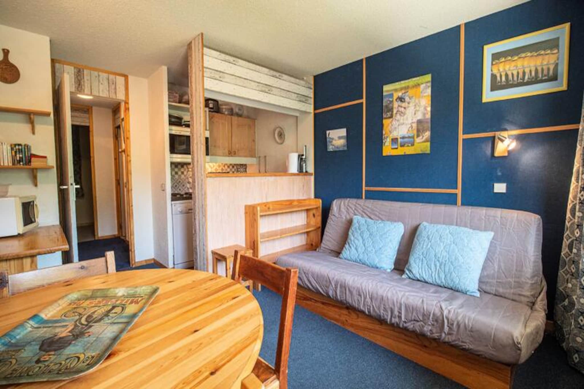 Imagine waking up to the crisp alpine air and breathtaking views from your southwest-facing balcony in this charming two-room apartment in the Crève Coeur area. Just 20 meters from the nearest slope and 200 meters from the ski lifts, this cozy retreat places you at the heart of your mountain adventure, whether you're a seasoned skier or a beginner exploring the magic of the Alps. The Cheval Blanc residence offers a perfect blend of convenience and tranquility, nestled amidst the stunning scenery of the French Alps. \n\nInside, the apartment is thoughtfully designed for comfort and functionality. The open-plan kitchen is equipped with an electric hob, dishwasher, oven, and refrigerator, making it easy to prepare hearty meals after a day on the slopes. The living room features a comfortable sofa bed for two and a television, while the separate bedroom includes bunk beds and a trundle bed, accommodating up to five guests. A bathroom, separate toilet, and ski locker add to the practicality of this mountain getaway. Please note that Wi-Fi is not included, allowing you to truly disconnect and immerse yourself in the serene alpine environment. \n\nStep outside, and you'll find yourself just a short walk from shops, restaurants, and the vibrant atmosphere of the resort. The Pierrafort gondola provides easy access for beginners and families, while experienced skiers can head straight to the Côte Soleil ski lift. In summer, the area transforms into a haven for hikers and nature enthusiasts, offering endless trails and panoramic vistas. \n\nWhether you're seeking thrilling winter sports or a peaceful summer escape, this apartment offers the perfect base for unforgettable alpine memories. With its prime location, cozy amenities, and stunning views, it's an ideal choice for families, friends, or couples looking to experience the best of the French Alps.