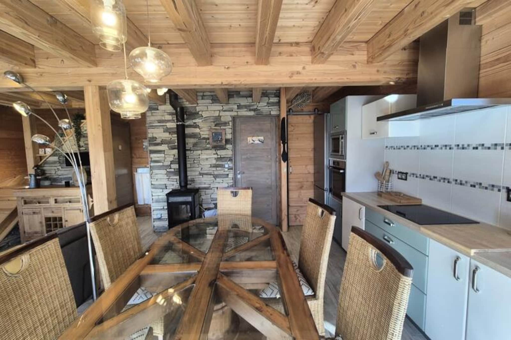 In the serene heart of La Féclaz, this stunning mountain chalet invites you to experience the perfect alpine getaway. Surrounded by breathtaking natural beauty, this spacious retreat spans three levels and comfortably accommodates up to 10 guests, making it ideal for families or groups of friends seeking a memorable escape. With its harmonious blend of modern amenities and rustic charm, this chalet offers a warm and inviting atmosphere that will make you feel right at home.
Step inside to discover a bright and airy living space, complete with a cozy fireplace and underfloor heating to ensure your comfort during chilly evenings. The south-facing bay window floods the room with natural light and provides an uninterrupted view of the surrounding landscape, while offering direct access to the terrace. The fully equipped kitchen is perfect for preparing hearty meals after a day of adventure, and the entrance boasts generous storage for all your gear.
The chalet features a variety of sleeping arrangements, including a comfortable double bedroom, a family room with two double beds and a TV, and two additional double bedrooms with balcony access—one of which includes a private bathroom. A separate shower room and WC ensure convenience for all guests. For added practicality, the chalet offers a laundry room, ski storage, and fiber optic internet with wired connections in every room, keeping you connected even in this tranquil mountain haven.
With direct ski access, you can return effortlessly after a day on the slopes, while the charming village of La Féclaz and its surrounding nature provide endless opportunities for outdoor activities. Whether you're skiing, hiking, or simply unwinding by the fire, this chalet is your gateway to an unforgettable alpine experience. Book your stay now and create lasting memories in this enchanting setting.