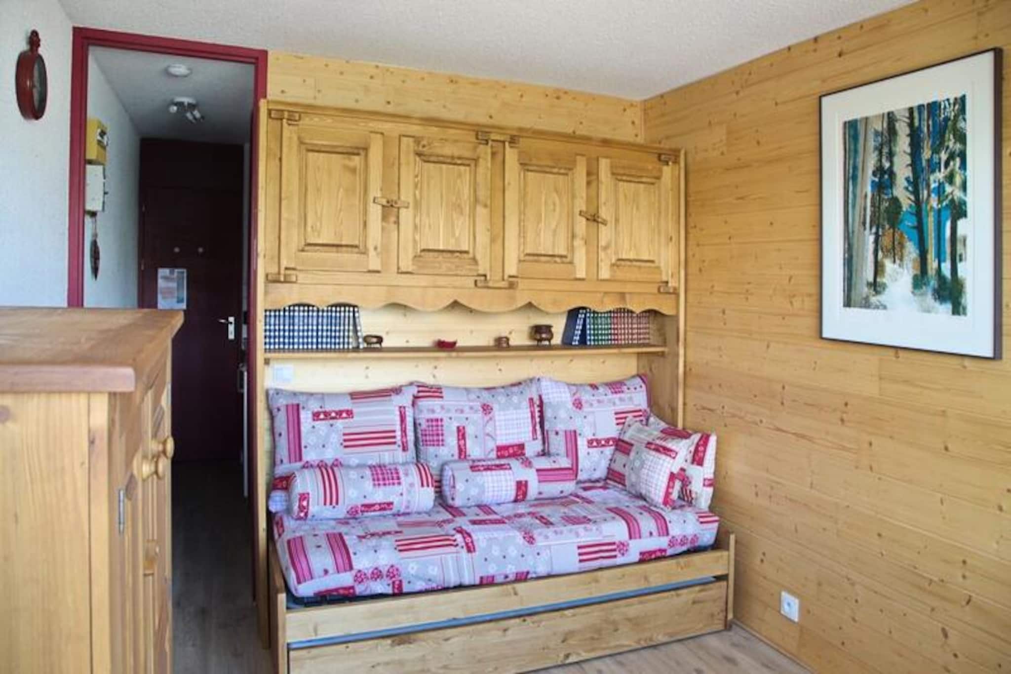 High above the Tarentaise Valley, this charming studio offers a cozy retreat for two in the serene Observatoire district of Les Coches. From your private balcony, take in breathtaking views of Mont Blanc and the surrounding alpine landscapes as the sun sets over the northwest horizon. Perfect for couples or solo travelers, this top-floor hideaway is a peaceful escape from the bustle of everyday life.
The 17 m² studio is thoughtfully designed to maximize comfort and functionality. The living area features a single sofa bed with a pull-out bed, ideal for restful nights after a day of adventure. The compact kitchen is equipped with modern conveniences, including a combination oven, ceramic hobs, a refrigerator, and a Nespresso coffee maker, ensuring you can prepare meals with ease. The bathroom includes a toilet and all the essentials for a refreshing start to your day. Please note, the apartment is non-smoking, pet-free, and does not include Wi-Fi.
Nestled just 100 meters from the ski slopes and 300 meters from the resort center, the residence L'Équerre offers unparalleled convenience. Public parking is available right outside, and the ski locker ensures your gear is always ready for the next run. The Observatoire district is known for its tranquility and stunning vistas, with pedestrian paths connecting you to shops, restaurants, and the vibrant heart of Les Coches in under five minutes.
Whether you're here to carve through the snow in winter or explore the lush mountain trails in summer, this studio provides the perfect base to create unforgettable alpine memories. With Mont Blanc as your backdrop and the slopes at your doorstep, your mountain adventure awaits.