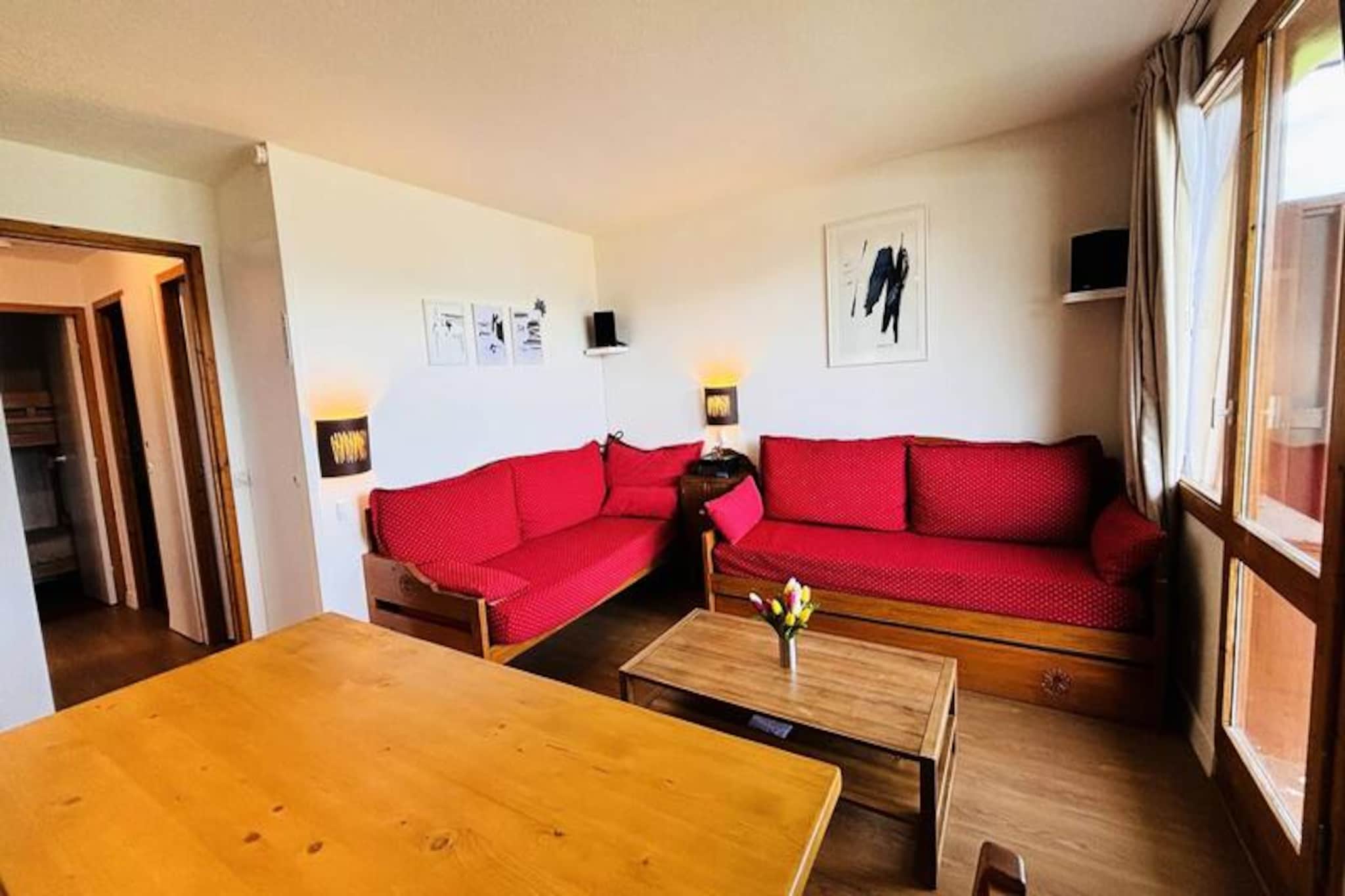 Where the forest meets the slopes, this charming ground-floor apartment in the Le Domino residence offers a cozy alpine retreat with breathtaking views of Mont Blanc. Imagine waking up to the serene beauty of the mountains, stepping out onto your private terrace with a steaming cup of coffee, and planning your day of adventure in the heart of the French Alps. Perfectly blending traditional architecture with modern comfort, this residence is the ideal getaway for families or small groups seeking both tranquility and convenience.
The 37 m² apartment is thoughtfully designed to accommodate up to six guests. It features a comfortable bedroom with a double bed, a sleeping alcove with bunk beds, and a living room with two single beds, a TV, and a stereo system. The fully equipped kitchen includes everything you need to prepare hearty meals, from a dishwasher and microwave to a raclette grill for authentic alpine dining. Additional amenities such as a washing machine, ceramic hobs, and a separate toilet ensure a hassle-free stay. While the apartment does not have Wi-Fi, its cozy ambiance and stunning views more than make up for it. The residence also provides a ski locker for your convenience.
Le Domino is ideally situated just 200 meters from the slopes and ski lifts, making it a dream for winter sports enthusiasts. The ice rink is a mere 50 meters away, and the resort center, with its shops and restaurants, is easily accessible via a free cable car or a short walk. In summer, the surrounding forest and trails invite you to explore the natural beauty of the Alps. Whether you're skiing, hiking, or simply soaking in the views, this location offers something for everyone.
With its prime location, stunning vistas, and cozy amenities, this apartment is your gateway to unforgettable alpine adventures. Book your stay and experience the magic of Mont Blanc up close.