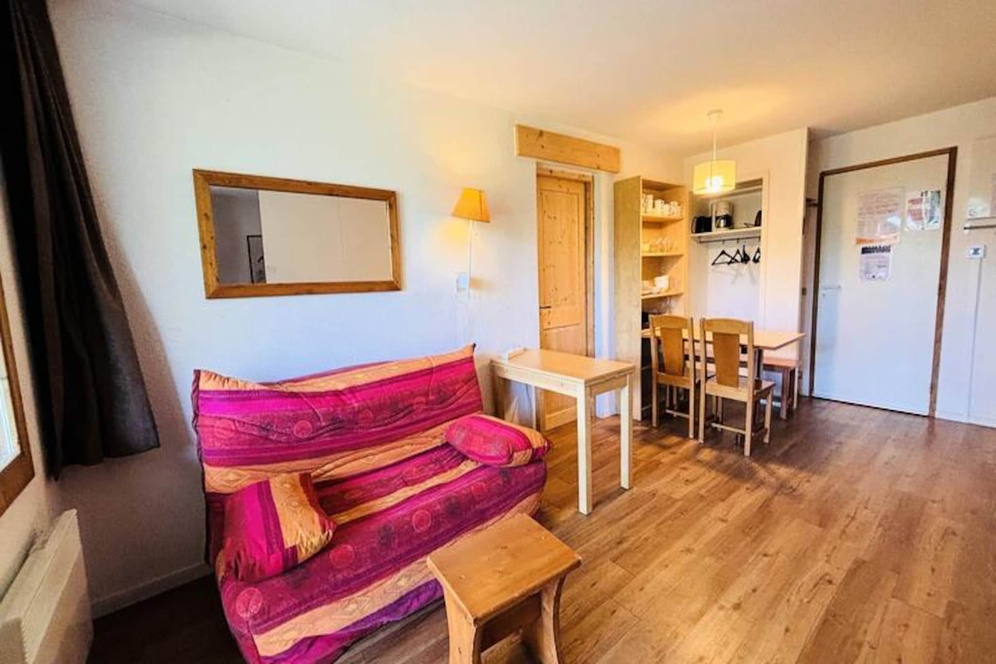 Surrounded by the serene beauty of the French Alps, this charming 2-star accommodation offers a cozy retreat for up to six guests. Located on the first floor of the L'Épervier residence, the property consists of two connecting apartments, each thoughtfully designed to provide comfort and functionality. With its peaceful forest-edge setting and ski-in/ski-out access, it’s a perfect base for both winter sports enthusiasts and summer adventurers alike. The north-facing terraces invite you to soak in the crisp mountain air while admiring the breathtaking alpine views.
The first apartment features a sleeping alcove with bunk beds, a living room with two single beds, and a well-equipped kitchenette complete with a microwave, washing machine, and coffee maker. The second apartment includes a bedroom with a double bed enclosed by a movable partition, a cozy living room with a TV, and a kitchenette boasting modern amenities like a dishwasher and toaster. Both apartments have private bathrooms and share the convenience of duvets and ample storage, including a ski locker within the residence. For added convenience, a garage box accommodating two vehicles is available for rent nearby.
The L'Épervier residence is nestled on the edge of a tranquil forest, offering immediate access to the blue ski slope and a short 10-minute walk to the resort center, where you’ll find shops, restaurants, and après-ski activities. Its traditional alpine architecture, blending wood, stone, and slate, creates a warm and inviting ambiance. Whether you’re skiing down the pristine slopes of Montchavin in winter or exploring scenic hiking trails in summer, this location ensures unforgettable experiences.
With its prime location, practical amenities, and serene surroundings, this property is an ideal choice for families or groups seeking a memorable alpine getaway. Book your stay today and immerse yourself in the charm and adventure of the French Alps.