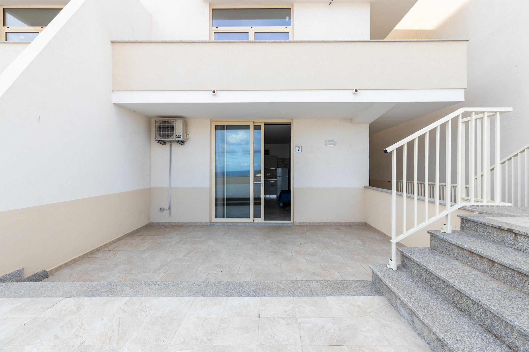 On the 1st floor: (open kitchen(hob(induction), hood, espresso machine, fridge-freezer), Living/bed room(single sofa bed, double bed, dining table), bathroom(shower, washbasin, toilet, bidet), air conditioning, terrace)