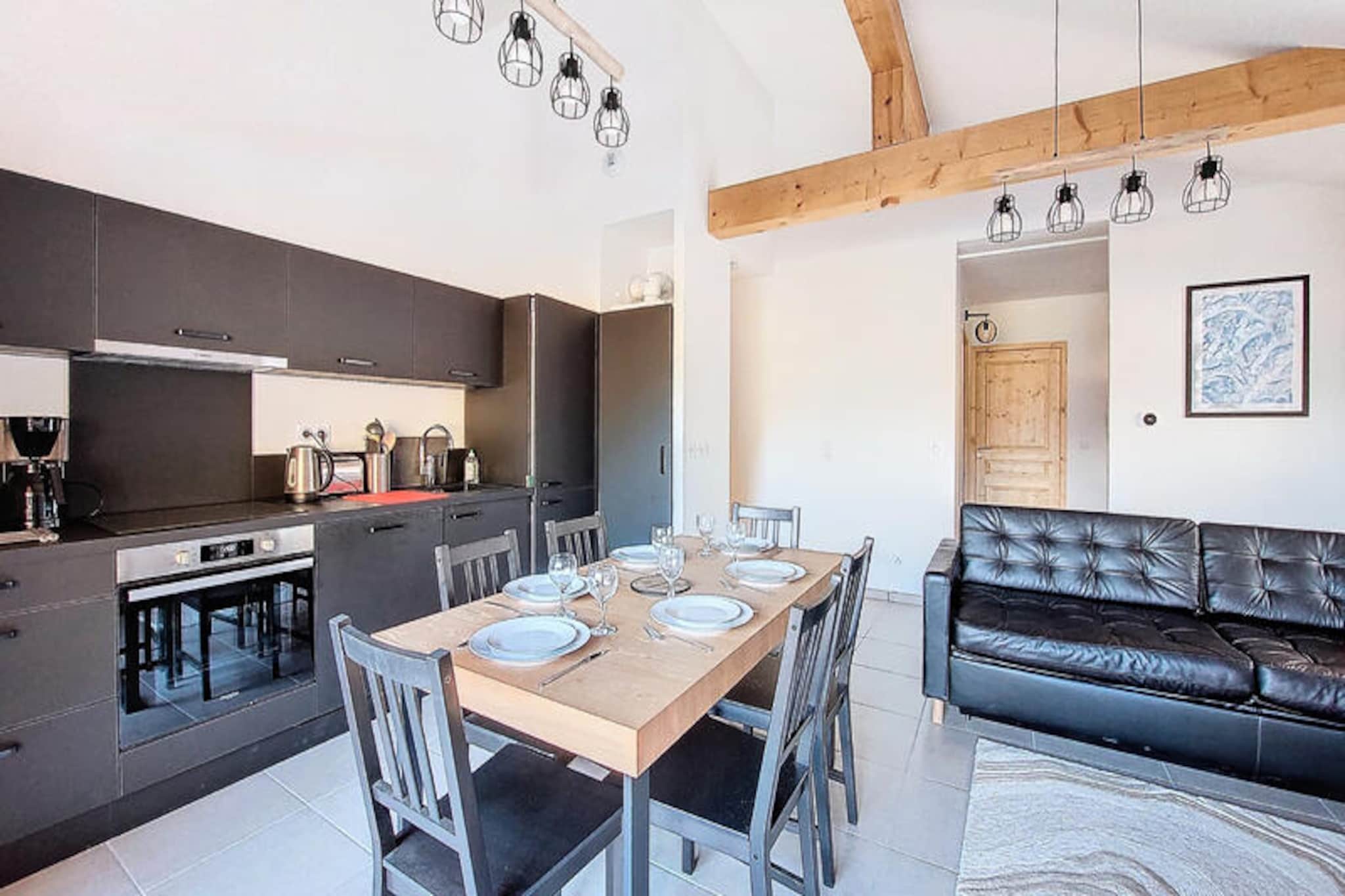 Where the majestic peaks of the Haute-Savoie meet the charm of Saint-Jean-d'Aulps, this brand-new apartment invites you to experience the ultimate alpine getaway. Imagine waking up to breathtaking mountain views, stepping onto your private terrace to sip a morning coffee, and heading straight to the slopes with ski-in access just outside your door. Whether you're here for winter sports or summer hikes, this serene retreat offers the perfect blend of comfort and adventure in the heart of the French Alps. \n\nSpanning 66 square meters, the apartment accommodates up to eight guests with thoughtful design and modern amenities. The master bedroom features a plush double bed, en-suite bathroom, and a desk area for quiet moments. A second bedroom with twin beds and a cozy sleeping alcove with bunk beds ensure restful nights for all. The living area boasts a smart TV, a double sofa bed, and a dining space that flows into a fully equipped kitchen, complete with an induction hob, dishwasher, and coffee maker. Two sleek bathrooms with walk-in showers and a washing machine add convenience, while the private terrace invites al fresco dining with panoramic views. \n\nBeyond the apartment, you'll find a secure garage for two cars and a ski room to store your gear. The resort offers easy access to the cable car, local shops, and restaurants, making it a hub for both relaxation and exploration. In summer, discover hiking trails, cycling routes, and the natural beauty of the Alps, while winter transforms the region into a snowy paradise for skiing and snowboarding. \n\nWhether you're seeking thrilling outdoor adventures or tranquil mountain moments, this apartment is your gateway to unforgettable memories in Saint-Jean-d'Aulps.