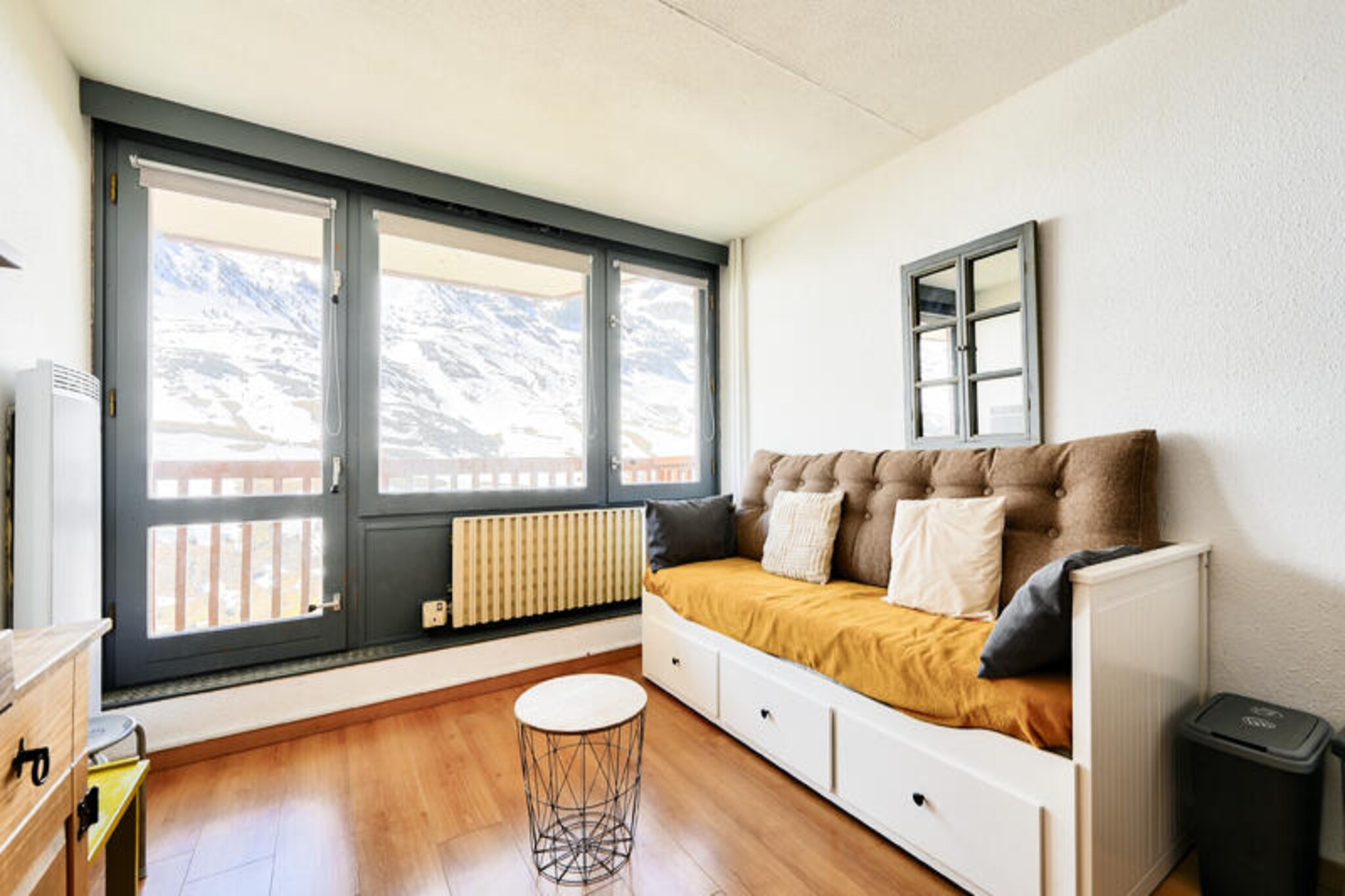 High in the majestic Pyrenees, where snow-dusted peaks meet endless skies, the La Mongie Tourmalet Residence offers a serene alpine escape. Just 1 km from the vibrant heart of La Mongie resort, this cozy retreat combines the thrill of ski-in/ski-out access with the tranquility of a mountain hideaway. Whether you're seeking adventure or relaxation, this property is your gateway to unforgettable winter or summer experiences. 

Inside, the residence features a thoughtfully designed 28 m² apartment, perfect for couples or small families. The living room, with its comfortable sofa bed, opens onto a private balcony where you can savor crisp mountain air and breathtaking views. The open-plan kitchen is equipped to prepare hearty meals after a day on the slopes, while the dining area provides a welcoming space to gather. The bathroom includes a bathtub with shower, ensuring comfort and convenience. Additional amenities such as WiFi, baby kits, and linen services are available upon request, making your stay as seamless as possible.

Just 300 meters away, you'll find everything you need: ski lifts, the ESF office, a shopping mall, and more. A complimentary shuttle service connects the residence to the resort center, running until 10 p.m. during school holidays. Beyond skiing, the area offers a wealth of activities, from snowmobiling and dog sledding to snowshoeing and sledding, ensuring there's something for everyone.

Whether you're drawn by the thrill of the slopes or the allure of the Pyrenees' natural beauty, the La Mongie Tourmalet Residence promises a memorable stay. Embrace the charm of mountain living and create lasting memories in this enchanting destination.