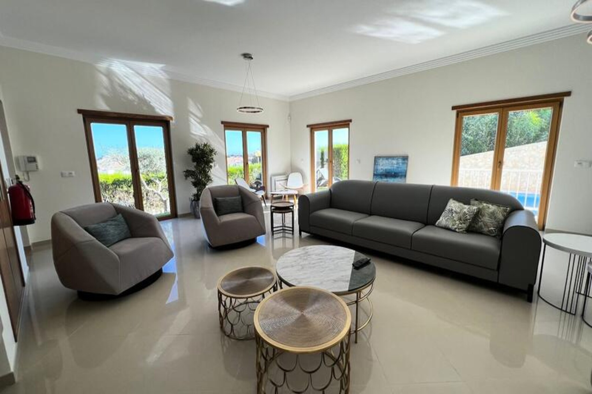 Overlooking the vibrant Albufeira Marina, this stunning four-bedroom villa offers an unparalleled blend of luxury and comfort, making it the perfect retreat for families and groups of up to 10 guests. Imagine waking up to serene views of the marina, enjoying a leisurely breakfast on the terrace, and spending your days exploring the Algarve’s sun-drenched coastline or simply relaxing by your private pool. With its spacious layout and modern design, this villa promises a holiday filled with unforgettable moments.
The villa boasts a fully equipped kitchen, ideal for preparing meals to enjoy al fresco in the shaded poolside lounge. The private grounds provide ample space for children to play, while adults can unwind on the sun loungers or host a barbecue in the warm Portuguese sun. Each of the four bedrooms is designed with comfort in mind, ensuring restful nights after days of adventure. For long-term stays, utility bills are managed separately, offering flexibility for extended vacations.
Located just a 10-minute stroll from the marina’s lively restaurants, bars, and shops, and only a 20-minute walk to Albufeira Old Town and its golden beaches, this villa places you at the heart of the Algarve’s charm. Nearby, you’ll find local grocery stores, including Aldi and Apolónia, as well as traditional eateries serving fresh, regional cuisine. For families traveling with children, renting a car is recommended to explore the area’s hidden gems, from picturesque lagoons to quaint countryside villages.
Whether you’re seeking relaxation or adventure, this villa offers the perfect base to create cherished memories. With 24-hour guest support and optional private transfers, every detail of your stay is thoughtfully taken care of. Experience the best of Albufeira in this luxurious haven, where privacy, convenience, and natural beauty converge.