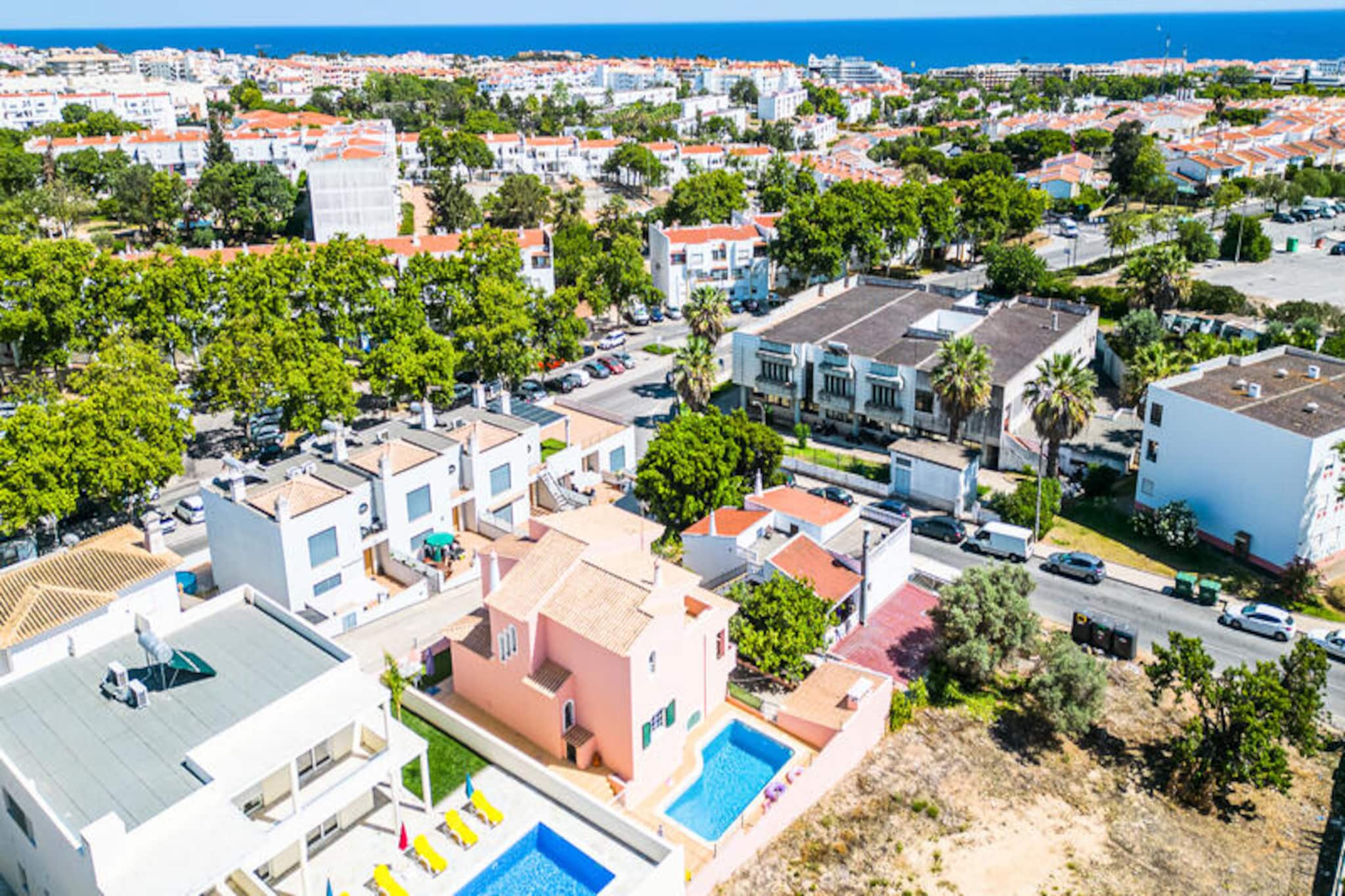 Imagine waking up to the golden hues of the Algarve sun streaming through your window, stepping out onto your private terrace, and feeling the gentle coastal breeze. At Villa Impasse, a recently renovated retreat, every moment is designed to immerse you in comfort and relaxation. Located just steps from the heart of the old town, this villa offers the perfect blend of tranquility and vibrant local charm. Whether you're here for a family getaway or a group escape, this property promises unforgettable memories.
The villa boasts four spacious bedrooms, three of which feature en-suite bathrooms, ensuring privacy and convenience for all guests. A sleek, fully equipped kitchen opens into a welcoming living and dining area, where a large table invites everyone to gather for meals and laughter. Outside, a generous swimming pool awaits, surrounded by sun loungers and a sunny barbecue area, perfect for al fresco dining under the Portuguese sky. For added convenience, the villa includes a guest bathroom and a garage accommodating up to three cars.
Everything you need is within a 10-minute walk, from local supermarkets offering fresh seafood and bread to a variety of dining options showcasing the region's culinary delights. The nearby beach and lively old town provide endless opportunities for exploration and entertainment. Whether you're strolling through cobblestone streets or basking on the golden sands, the Algarve's charm is at your doorstep.
Villa Impasse is more than just a holiday home; it's your gateway to the best of Portugal. With its prime location, modern amenities, and inviting atmosphere, it’s the perfect setting for creating cherished moments with loved ones. Book your stay today and experience the magic of the Algarve firsthand.