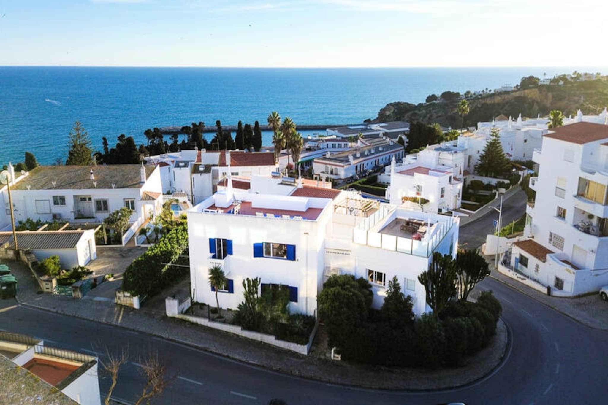 Imagine waking up to the sound of waves gently lapping the shore and stepping out onto a terrace that offers sweeping views of the Atlantic Ocean. This charming Algarve house in Albufeira is the perfect retreat for those seeking a blend of coastal beauty and vibrant city life. Just a short stroll from the iconic Praia do Tunnel (Peneco) and the bustling heart of Albufeira, you’ll find yourself surrounded by golden beaches, lively nightlife, and authentic Portuguese charm. Whether you’re exploring traditional shops or savoring fresh seafood at local restaurants, everything you need is just minutes away.
The house itself is a delightful mix of comfort and functionality, spread across three levels. The ground floor features two cozy bedrooms and a bathroom, creating a restful space for a good night’s sleep. On the first floor, you’ll find a bright living room, a fully equipped kitchen perfect for preparing meals with local ingredients, and a terrace where you can enjoy al fresco dining. The crowning jewel of this home is the expansive rooftop terrace, offering unparalleled sea views – the ideal spot for morning coffee or sunset cocktails.
Conveniently located just one minute from a supermarket, this property ensures you have everything at your fingertips. For those staying longer, arrangements for electricity bills and other services are easily managed. Whether you’re a family, a group of friends, or even traveling with pets, this home accommodates all with thoughtful touches and flexible options.
Choose this Albufeira gem for your next getaway and immerse yourself in the sun-soaked allure of the Algarve. With its prime location, stunning views, and welcoming ambiance, it promises a holiday filled with relaxation and unforgettable memories.