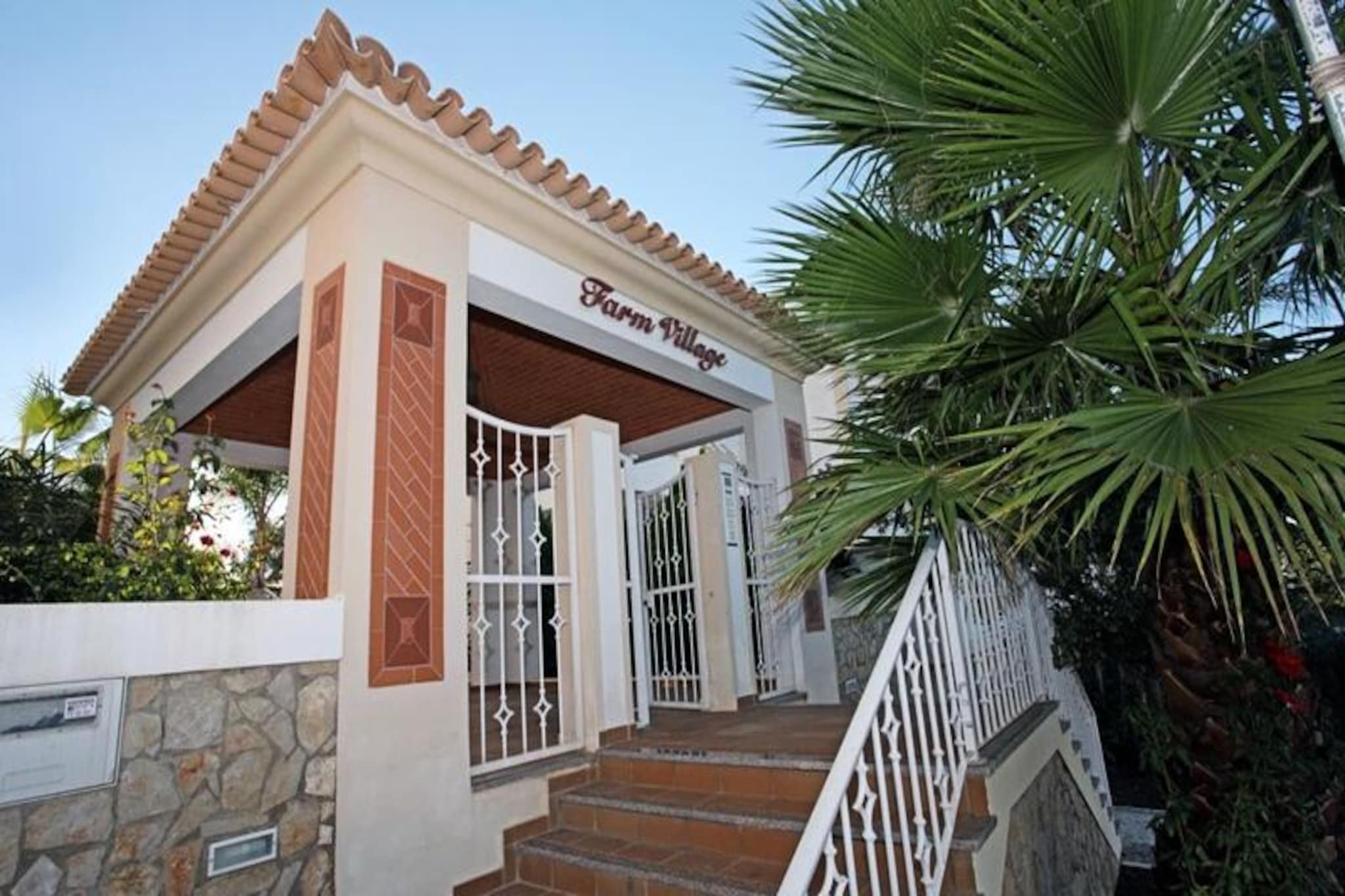 In a serene and upscale neighborhood of Portugal, this charming villa offers the perfect retreat for families seeking tranquility and comfort. Just a short 200-meter stroll brings you to the historic old town, where cobblestone streets lead to vibrant bars, boutique shops, delectable restaurants, and a golden sandy beach. The area is well-connected with a bike path and pedestrian walkway, making it easy to explore the surroundings at your leisure. Whether you're looking for relaxation or adventure, this location provides the best of both worlds. 
 
 The villa is part of a well-maintained complex featuring two inviting swimming pools—one for adults and one for children—a tennis court, and even a ping-pong table for some friendly competition. Families will appreciate the safe environment, complete with a spacious parking lot to ensure the security of your vehicle. A cozy on-site restaurant serves delicious meals at reasonable prices, adding convenience to your stay. Inside the villa, you'll find all the essentials for a comfortable holiday, with a focus on family-friendly amenities and a peaceful atmosphere. 
 
 Nearby, you'll find a grocery store less than 1 km away, a bus stop just 300 meters from the complex, and a public outdoor gym within a 400-meter walk. For those who enjoy a leisurely stroll, the old town is less than 25 minutes away on foot. The villa’s location ensures you’re close to essential services while remaining far enough from the hustle and bustle to enjoy a truly relaxing holiday. 
 
 Perfect for families, this villa combines comfort, convenience, and a peaceful setting, making it an ideal choice for your next getaway. Whether you're lounging by the pool, exploring the historic old town, or enjoying a family meal at the on-site restaurant, every moment here is designed to create lasting memories.