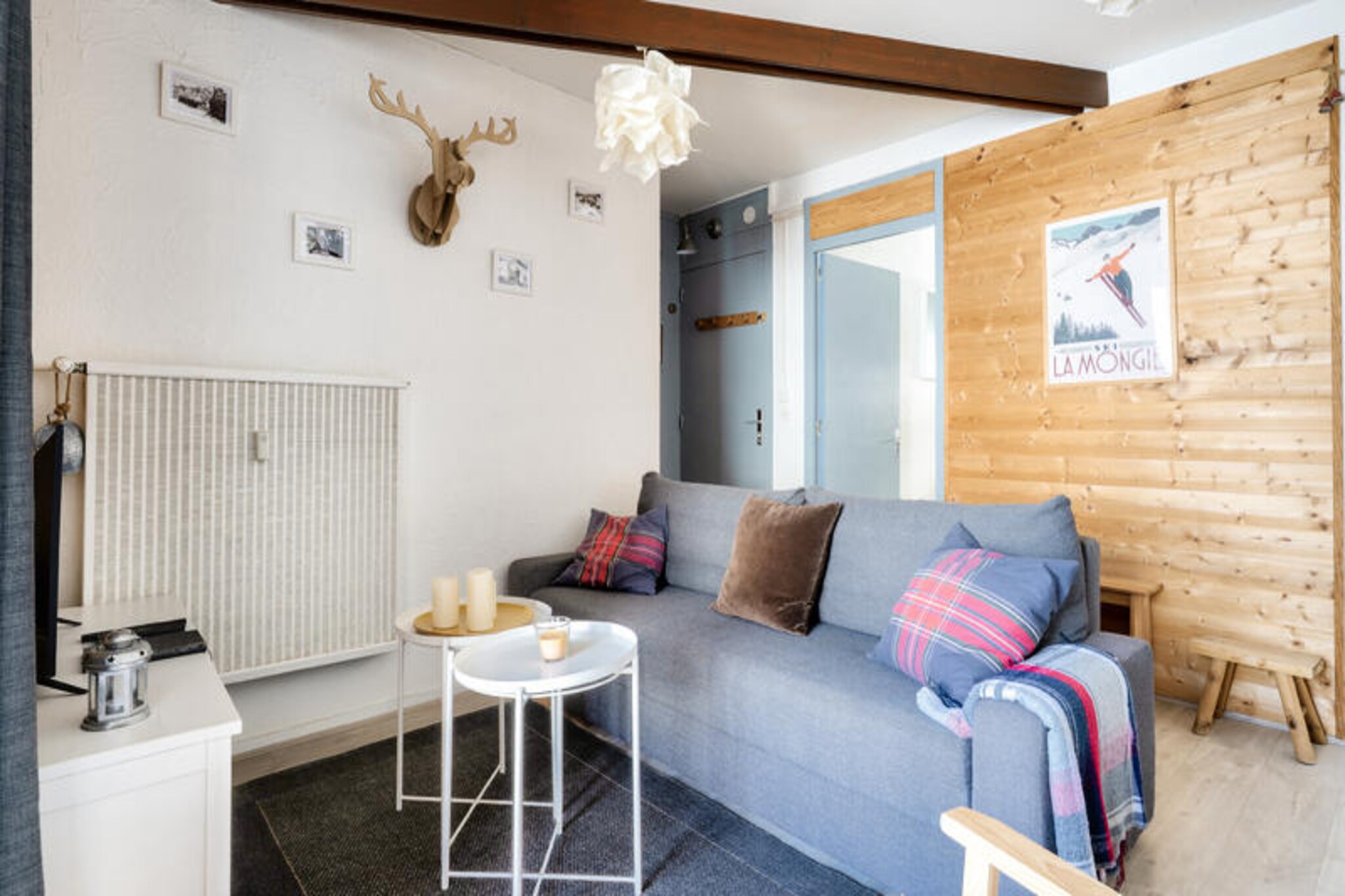 High above the Pyrenees, where crisp mountain air meets the charm of La Mongie, this delightful apartment offers a perfect retreat for ski enthusiasts and nature lovers alike. Imagine waking up to the sun rising over snow-capped peaks, stepping onto your private south-facing terrace, and soaking in breathtaking views of the surrounding mountains. Whether you're here for thrilling winter adventures or serene summer escapes, this property places you at the heart of it all. \n\nDesigned for comfort and convenience, the apartment features a cozy living room with a sofa bed, an open-plan kitchen, and a dining area that seats up to six guests. The bedroom accommodates three with a double bed and a single bed, ensuring restful nights for families or small groups. The modern bathroom boasts a walk-in shower, while a separate toilet adds practicality to the layout. With 36 m² of thoughtfully arranged space, this home combines functionality with a welcoming ambiance. \n\nJust steps from the slopes, ski lifts, and resort center, you'll find everything you need within 300 meters—shops, restaurants, and even the ESF ski school. A free shuttle service runs daily during school holidays, making it effortless to explore the vibrant resort scene. Beyond skiing, La Mongie offers activities like sledding, snowmobiling, dog sledding, and snowshoeing, ensuring fun for all ages. \n\nWhether you're seeking adrenaline on the slopes or tranquility in the mountains, this apartment delivers an unforgettable holiday experience. Let the magic of La Mongie and the Pyrenees create memories you'll cherish forever.