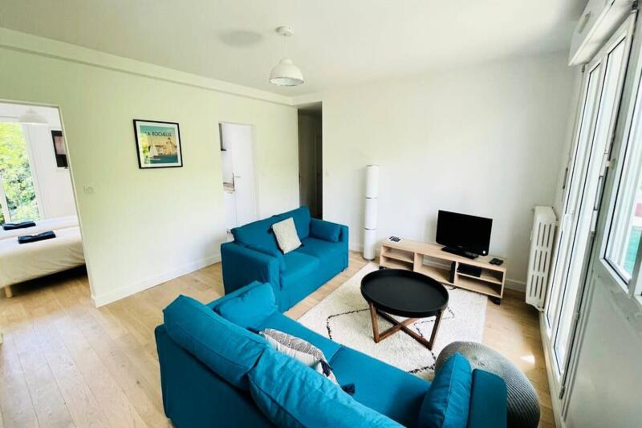 In the heart of the charming coastal city of La Rochelle, this newly renovated two-bedroom apartment offers a perfect blend of comfort and convenience for your next getaway. Tucked away in a quiet neighborhood with no overlooked views, this inviting retreat is just a short stroll from the vibrant city center, making it an ideal choice for families or friends seeking a relaxing escape. With secure private parking and a serene atmosphere, you’ll feel right at home from the moment you arrive.
The apartment features two cozy bedrooms, one with a plush queen-size bed (160x200) and the other with two comfortable single beds (90x200), ensuring restful nights for all. A bright and modern bathroom with a shower and sink, along with a separate toilet, adds to the convenience. The living room is a welcoming space to unwind, complete with a TV and Wi-Fi, while the fully equipped kitchen invites you to prepare delicious meals with ease. From a refrigerator with freezer to an induction hob, oven, microwave, toaster, kettle, and filter coffee maker, every detail has been thoughtfully considered.
Step outside and discover the best of La Rochelle just minutes away. The bustling Central Market is a 9-minute walk, while the picturesque Old Port and serene La Rochelle Parks are within a 15-minute stroll. For beach lovers, Concurrence Beach is a 7-minute bike ride, and the stunning Ile de Ré is just a 20-minute drive. Whether you’re exploring the Aquarium, savoring fresh seafood at local restaurants, or wandering the historic streets, this apartment places you at the heart of it all.
With the dedicated Aloha Concierge Service at your disposal, your stay will be seamless and memorable. From personalized recommendations to a warm welcome upon arrival, every detail is designed to ensure a stress-free experience. Come and enjoy the relaxed lifestyle of La Rochelle, where coastal charm meets modern comfort.