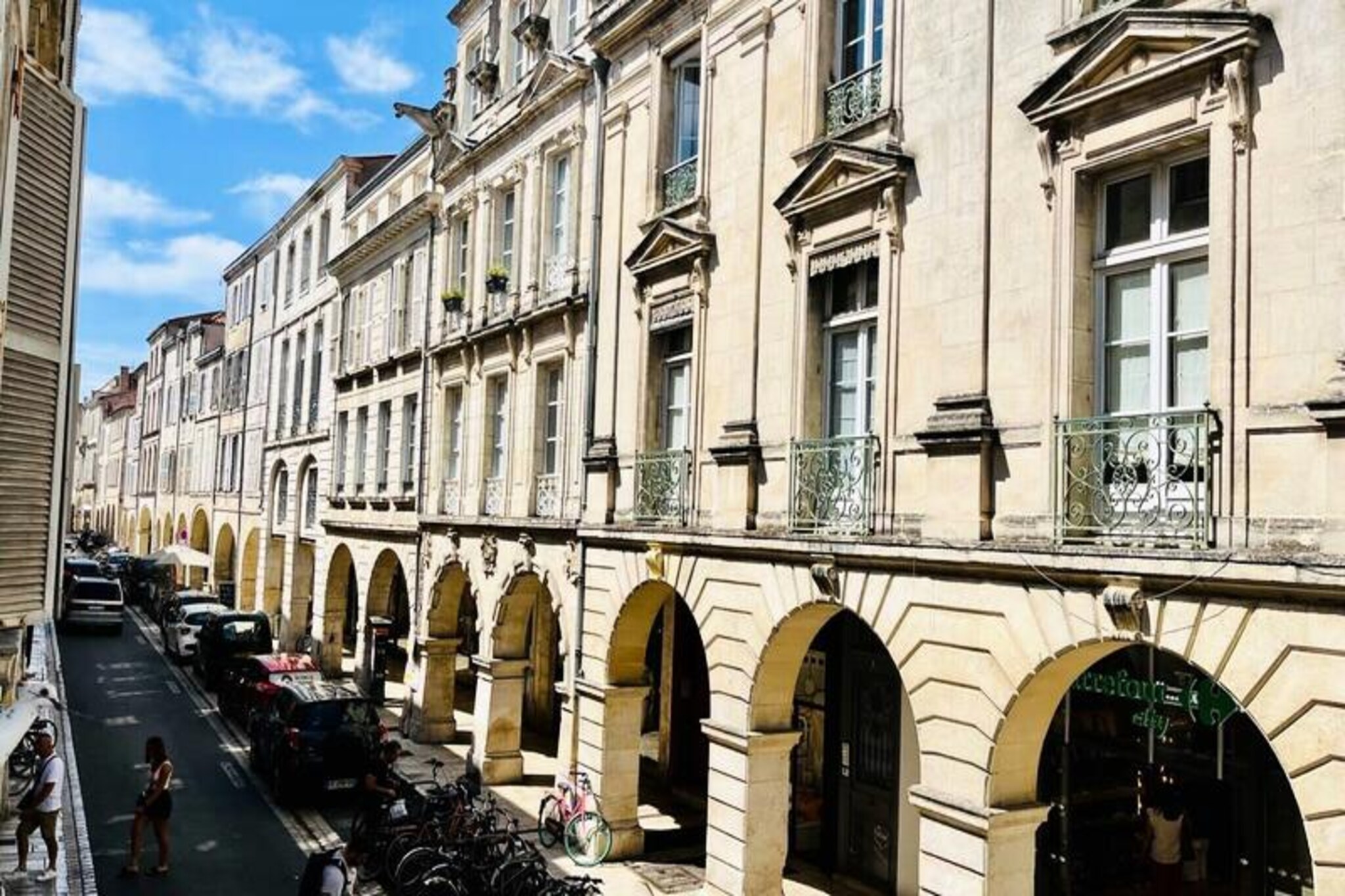 In the heart of La Rochelle's vibrant city center, this beautifully renovated apartment offers a perfect blend of modern comfort and historic charm. Just a short stroll from the iconic Old Port, bustling market, and charming boutiques, it invites you to immerse yourself in the lively atmosphere of this coastal gem. Whether you're exploring the cobblestone streets or savoring fresh seafood at a nearby restaurant, every moment here feels like a celebration of French seaside living.
Inside, the apartment is thoughtfully designed for couples, families, or friends seeking a cozy retreat. The spacious living room, with its open-plan kitchen and dining area, overlooks the lively streets below, creating a warm and inviting space to relax. The separate bedroom, complete with an en-suite bathroom, offers a peaceful escape, overlooking a quiet courtyard to ensure restful nights. Fully equipped with modern amenities such as a refrigerator, oven, dishwasher, and Nespresso coffee maker, this home-away-from-home ensures your stay is as comfortable as possible.
Step outside, and you'll find yourself just minutes from La Rochelle's highlights. The vibrant market and its covered halls are only a 2-minute walk away, while the picturesque Old Port is just 5 minutes on foot. For beach lovers, Concurrence Beach is a leisurely 15-minute walk, and the train station is equally accessible, making it easy to explore the surrounding region. With pedestrianized streets adding to the charm, you'll enjoy the freedom to wander at your own pace.
Whether you're here for a romantic getaway, a family adventure, or a cultural escape, this apartment is your gateway to the best of La Rochelle. Let the Aloha Concierge Service guide you to hidden gems and local favorites, ensuring your stay is truly unforgettable.