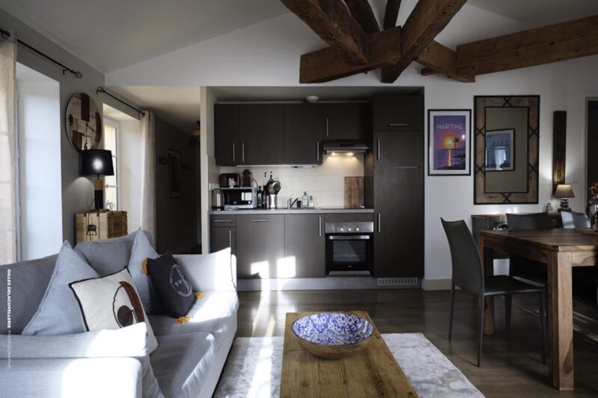 In the heart of the charming coastal city of La Rochelle, this delightful apartment offers a serene retreat for families, couples, or friends seeking a memorable getaway. With its blend of modern comfort and French seaside charm, this property is the perfect base for exploring the historic streets, vibrant markets, and picturesque harbor of this iconic destination. Whether you're here for a relaxing holiday or a productive business trip, this apartment welcomes you with open arms.
Inside, you'll find a thoughtfully designed space featuring one cozy bedroom with a double bed and a comfortable double sofa bed in the living area, accommodating up to four guests. The bathroom includes a bathtub, perfect for unwinding after a day of exploration. The open-plan kitchen is fully equipped with modern appliances, including a refrigerator, freezer, oven, microwave, dishwasher, coffee maker, and kettle, ensuring you have everything you need to prepare delicious meals. Additional amenities such as Wi-Fi, a television, an iron, and a hairdryer add to the convenience of your stay, while electric heaters ensure year-round comfort.
Step outside and enjoy the tranquility of your private 50m² garden, a rare gem in the heart of the city. Here, you can sip your morning coffee, read a book, or simply soak up the fresh coastal air. While pets are not allowed and the property is non-smoking, the serene environment ensures a peaceful and relaxing experience.
Ideally situated, this apartment places you within easy reach of La Rochelle's major attractions, including the historic Old Port, the iconic towers, and the bustling local markets. With sheets, towels, and cleaning included, all you need to do is arrive and start creating unforgettable memories in this enchanting seaside city.
