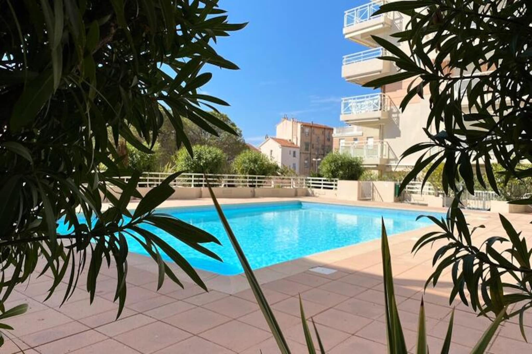 Awaken your senses in this beautifully renovated studio, perched on the third floor of a luxury residence in Golfe Juan. With a serene ambiance and breathtaking views of the sparkling sea and the inviting swimming pool, this air-conditioned retreat offers the perfect blend of comfort and elegance. Whether you're sipping coffee on the terrace or enjoying the gentle Mediterranean breeze, every moment here feels like a celebration of the French Riviera's charm.
Designed to accommodate up to three guests, the studio features a thoughtfully arranged main room with a double sofa bed and a single bed for a child. The open-plan kitchen is fully equipped, allowing you to prepare delicious meals with ease. A modern bathroom with a walk-in shower adds to the convenience, while Wi-Fi ensures you stay connected throughout your stay. Bed linen and towels are provided, ensuring a hassle-free experience.
Just 100 meters from the Port of Golfe Juan and 200 meters from pristine beaches, this location is ideal for exploring the Riviera's treasures. Cannes, with its glamorous allure, is a mere 7 km away, while Antibes, steeped in history, is just 5 km from your doorstep. The Golfe Juan train station, a short 300-meter stroll, offers effortless access to the region's highlights, making day trips a breeze.
Whether you're here to bask in the sun, explore coastal towns, or indulge in local cuisine, this studio is your gateway to unforgettable memories. Let the French Riviera enchant you with its beauty and sophistication.