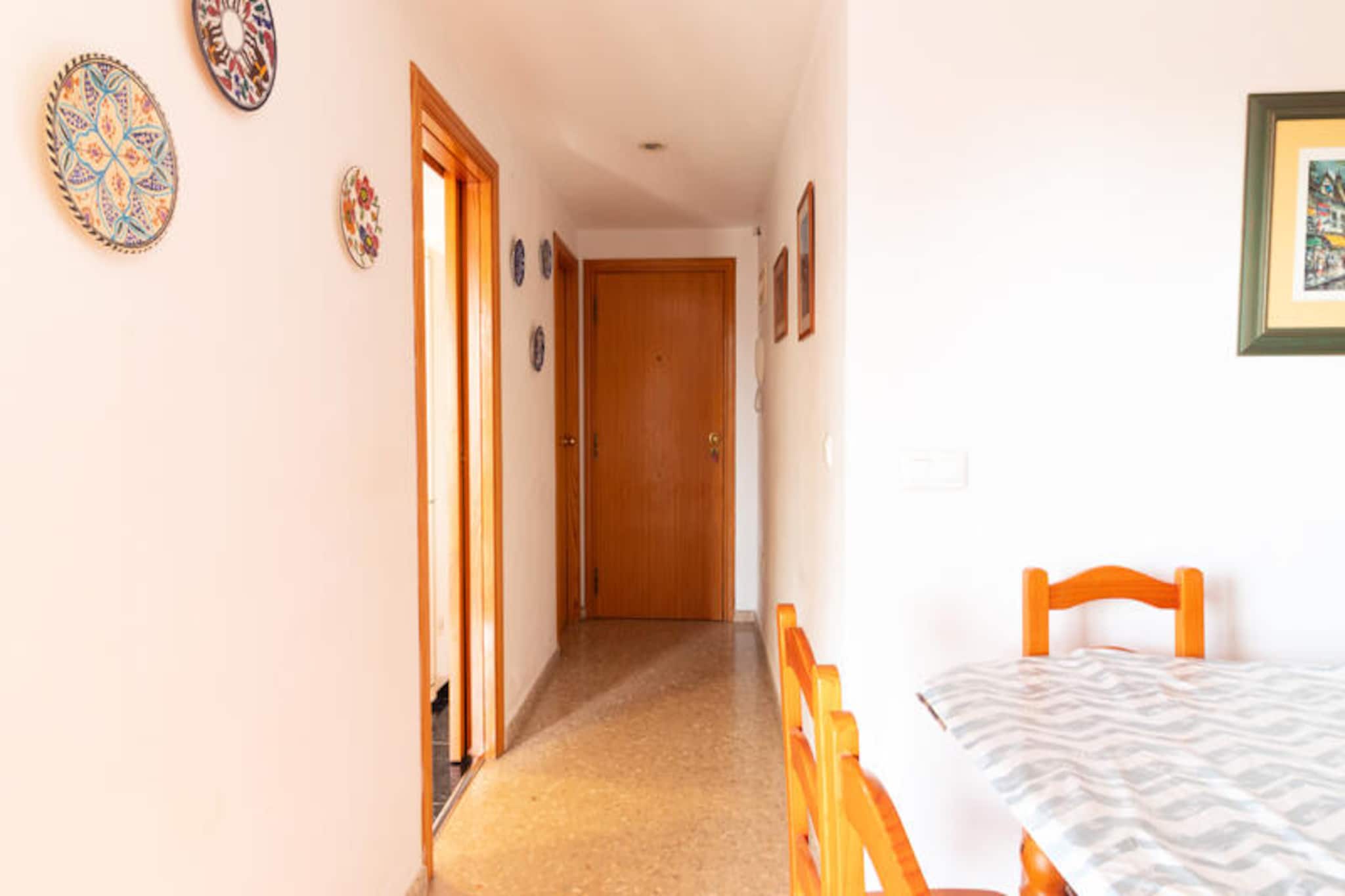 Step into a world of Mediterranean charm with this delightful family apartment in Canet d'en Berenguer. Perfectly suited for families or couples, this spacious accommodation comfortably hosts up to seven guests, offering a serene retreat along the stunning Valencian coast. Whether you're seeking relaxation or adventure, this property provides the ideal base for your holiday.
Inside, you'll find three cozy bedrooms with versatile sleeping arrangements, including a double bed, bunk beds, and a sofa bed, ensuring restful nights for everyone. The fully equipped kitchen boasts modern appliances such as a refrigerator, washing machine, oven, microwave, coffee maker, and toaster, making it easy to prepare delicious meals. The shared pool invites you to unwind and cool off under the warm Spanish sun, while Wi-Fi and two televisions provide entertainment for quiet evenings indoors. Additional amenities like electric heating and an iron ensure a comfortable stay throughout your visit.
Located in a tranquil yet central area of Canet d'en Berenguer, this apartment is a gateway to exploring the region's natural beauty and cultural treasures. Stroll along pristine beaches, savor local cuisine at nearby restaurants, or immerse yourself in the vibrant atmosphere of Valencia, just a short drive away. The property also includes a free parking space for added convenience, making it easy to explore the surrounding area.
Whether you're dreaming of sun-soaked days by the sea or peaceful evenings in a cozy setting, this apartment offers everything you need for an unforgettable Mediterranean escape. Please note that pets and groups of young people are not permitted, ensuring a calm and family-friendly environment.