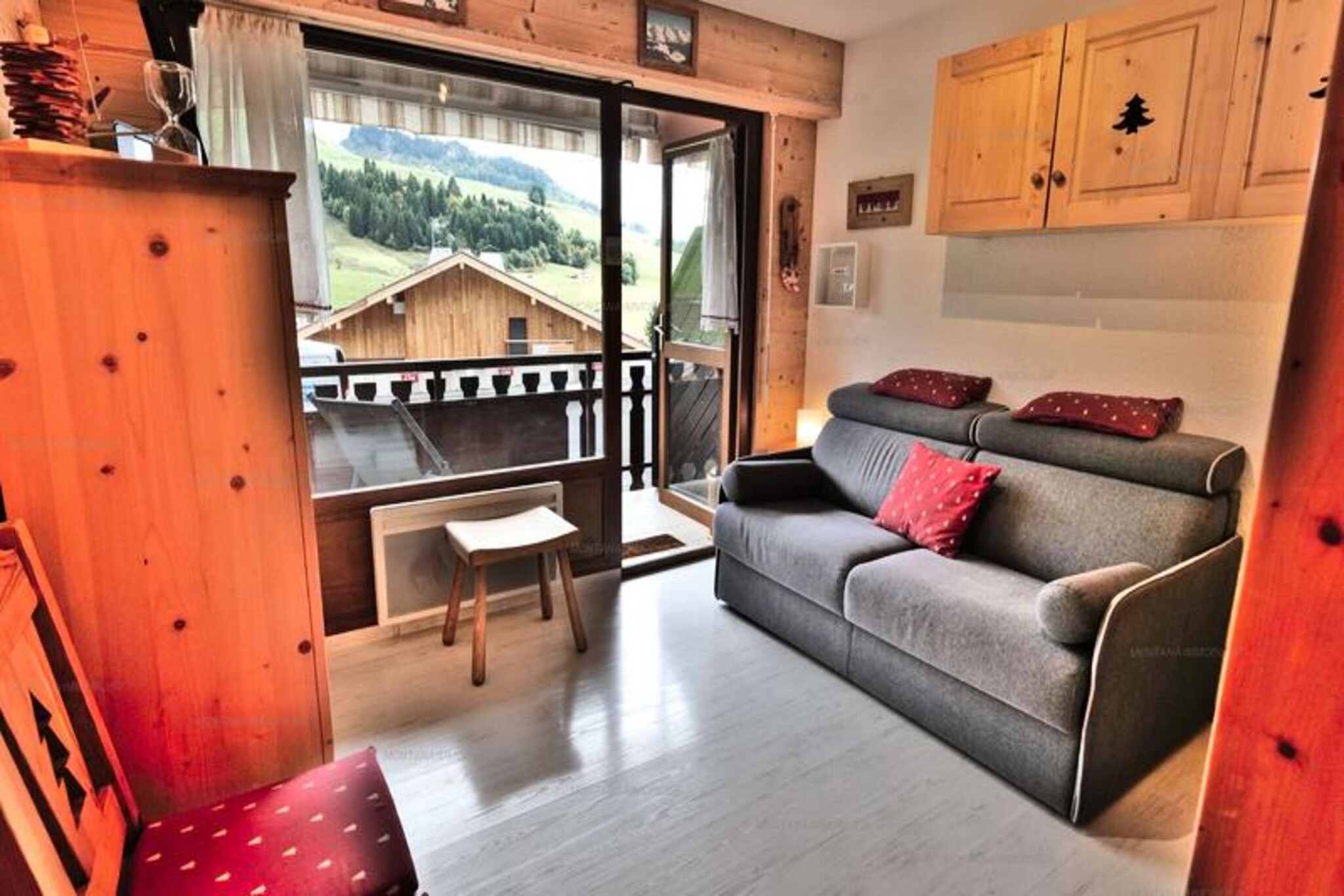 High above the charming Chinaillon resort, this delightful studio invites you to experience the serene beauty of the French Alps. Situated in the peaceful Samance neighborhood, this cozy retreat offers a warm Savoyard ambiance and panoramic views of the slopes from its sun-drenched south-facing balcony. Whether you’re here for a winter escape or a summer adventure, the tranquil setting and breathtaking scenery promise a memorable stay in the heart of the mountains. Renovated in 2023, the apartment blends modern comfort with alpine charm for a truly relaxing getaway. \n\nPerfectly designed for up to four guests, the studio features a thoughtful layout with a welcoming living area and a brand-new Rapido sofa bed, ensuring restful nights after days of exploration. The entrance hall includes two bunk beds, ideal for families or small groups, while the bathroom offers a refreshing shower and a separate toilet for added convenience. The covered parking space provides ease and security, and the absence of carpeting ensures a clean, allergy-friendly environment. Please note that sheets and towels are not provided, and a tourist tax applies to adults.\n\nLocated just 500 meters from local shops and 600 meters from the ski slopes, the residence is perfectly positioned for both relaxation and adventure. A free shuttle stop is only 10 meters away, making it easy to access the vibrant resort center and nearby attractions. In winter, enjoy skiing and snowboarding on pristine slopes, while summer brings opportunities for hiking, cycling, and soaking in the alpine sunshine. The peaceful Samance neighborhood offers a quiet retreat, yet remains close to all the action.\n\nChoose this charming studio for an unforgettable alpine escape. Whether you’re savoring the views from your balcony or exploring the natural wonders of the region, every moment here is infused with the magic of the mountains.