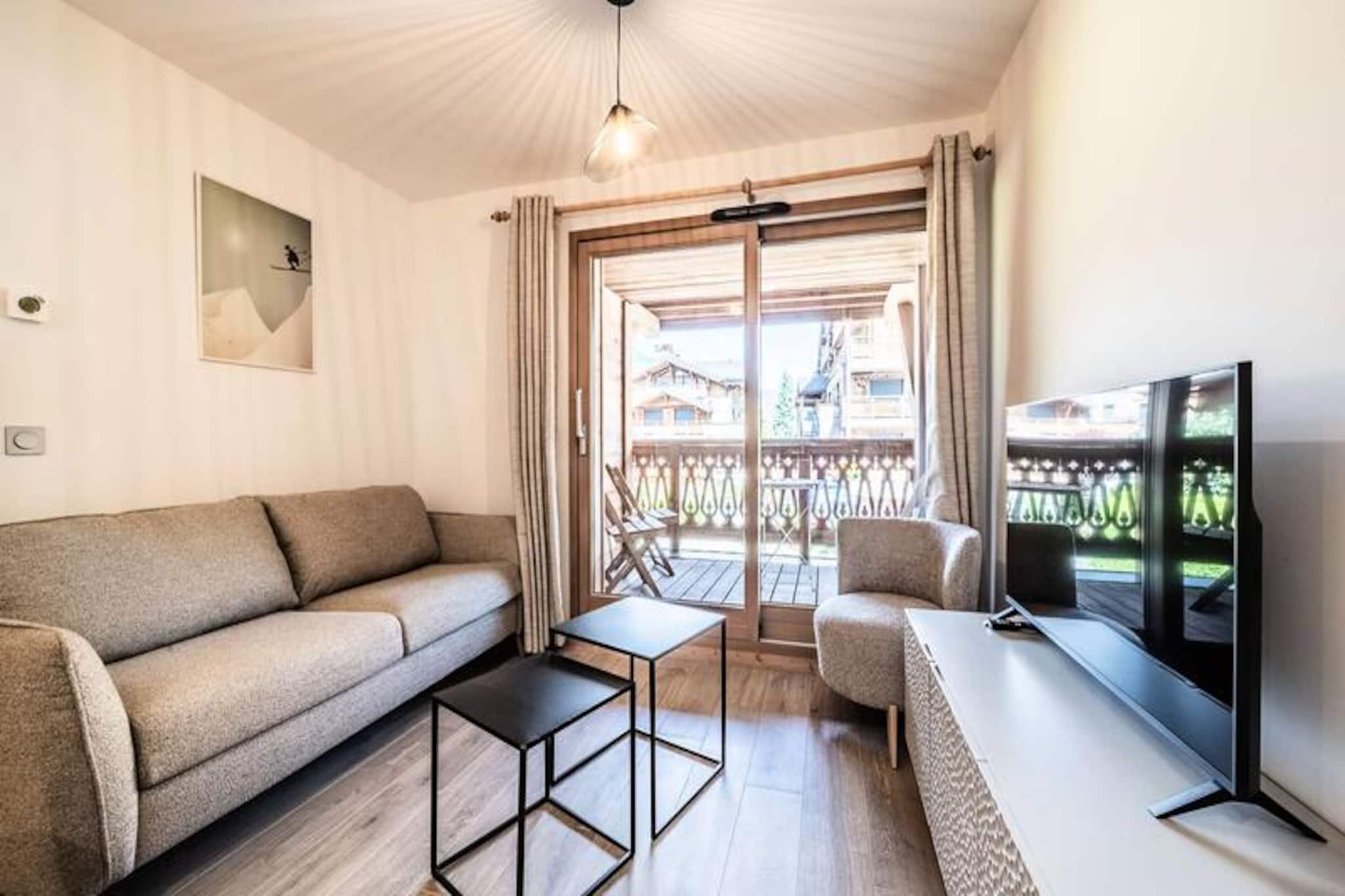 In the heart of the vibrant resort of Les Gets, this elegant apartment offers a harmonious blend of modern luxury and alpine charm. Imagine waking up to the crisp mountain air and stepping onto your private balcony to take in the panoramic views of the surrounding peaks. Whether you're seeking a peaceful retreat or an active holiday, this property provides the perfect base for your adventures in the French Alps. Its prime location ensures you're just moments away from the lively village atmosphere and the natural beauty of the region. \n\nDesigned to accommodate up to four guests, the apartment boasts a thoughtfully arranged 39.95m² space. The open-plan living area features a cozy sofa bed, a dining nook, and a fully equipped kitchen, ideal for preparing hearty meals after a day of exploration. The bedroom offers a plush double bed for restful nights, while the modern shower room adds a touch of convenience. Additional amenities include a washing machine, dishwasher, and a dedicated cellar for skis and bikes, complete with a boot dryer. With sheets and towels provided, beds made upon arrival, and end-of-stay cleaning included, every detail has been considered to ensure a seamless stay. \n\nLes Gets is renowned for its year-round activities, from skiing and snowboarding in winter to hiking and mountain biking in summer. The property’s proximity to key facilities and attractions makes it easy to immerse yourself in the local culture and outdoor pursuits. Explore charming shops, savor regional cuisine at nearby restaurants, or take advantage of the Summer Multipass to discover the area’s hidden gems. \n\nWhether you're drawn by the thrill of the slopes or the tranquility of alpine landscapes, this apartment invites you to experience the magic of Les Gets in comfort and style.
