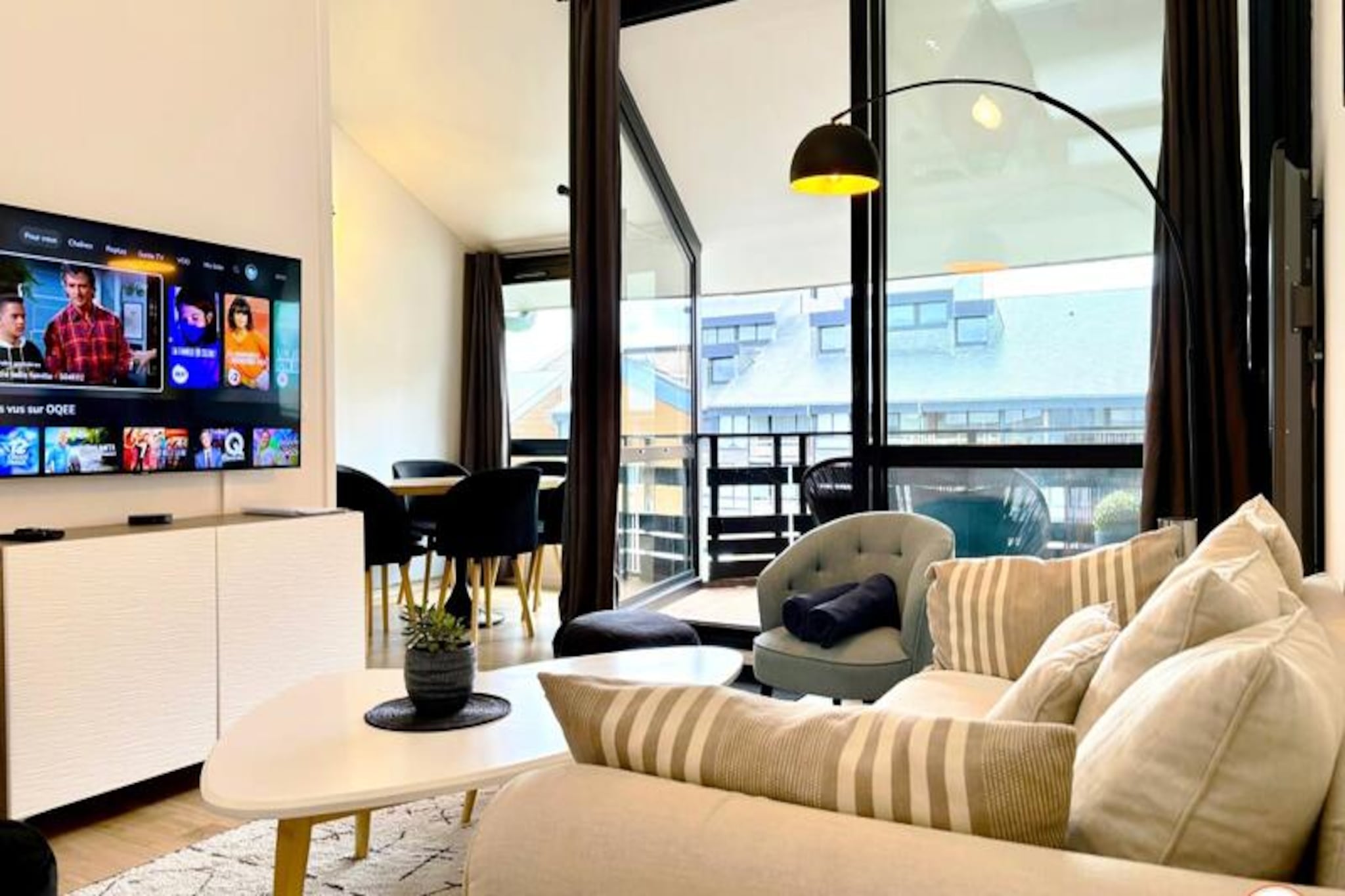 Overlooking the serene waters of Deauville's iconic marina, The White Pearl offers a harmonious blend of modern luxury and timeless charm. This beautifully renovated triplex apartment invites you to experience the best of Normandy, with its tranquil terrace views and a location just steps from the beach and vibrant town center. Whether you're sipping coffee on the terrace as the marina comes to life or strolling to the nearby casino, every moment here feels effortlessly elegant. 
 
 Designed to accommodate up to six guests, this stylish retreat spans three thoughtfully arranged levels. The lower level features a bright living room with a Smart TV, opening onto a terrace with garden furniture, perfect for alfresco dining or simply soaking in the marina views. A fully equipped kitchen, complete with modern appliances, connects to a cozy dining area for intimate meals. On the first floor, you'll find a serene bedroom with a queen-size bed overlooking the marina's courtyard, a high-quality fold-out bed, and a sleek walk-in shower room. The attic-level bedroom, accessible via a charming staircase, offers a queen-size bed and a private shower area, creating a cozy haven under the eaves.
 
 Step outside, and you'll find yourself just a two-minute walk from Deauville's golden sands and five minutes from its bustling town center, brimming with boutiques, restaurants, and cultural delights. The nearby casino and Place Morny add a touch of glamour to your stay, while the train station is conveniently within a 10-minute walk. For those arriving by car, a shared parking lot is available, ensuring ease of access throughout your visit.
 
 Whether you're here to unwind by the sea, explore the historic charm of Normandy, or indulge in Deauville's vibrant lifestyle, The White Pearl is your perfect coastal escape. Let the gentle rhythm of the marina and the allure of this enchanting town create memories you'll treasure forever.