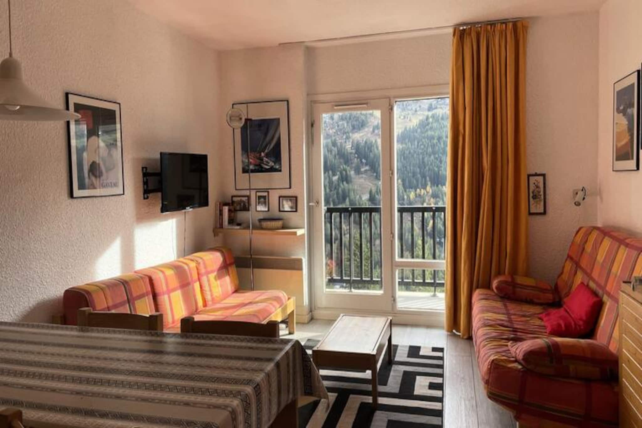In the heart of the picturesque Flaine Forêt district, this cozy studio offers a delightful alpine retreat just 150 meters from the slopes and ski school meeting points. Perfectly situated for both winter sports enthusiasts and summer adventurers, the residence is surrounded by charming shops and amenities, ensuring convenience at every turn. From its south-facing balcony, soak in the serene mountain views and the crisp alpine air, making every moment a breath of fresh tranquility. \n\nDesigned to accommodate up to four guests, the studio is thoughtfully laid out with a set of bunk beds in the entrance and a comfortable double sofa bed in the living area. The kitchenette is equipped with modern appliances, including a Vito ceramic hob, oven, and microwave, making it easy to prepare hearty meals after a day of exploration. Relax in the living room with a large flat-screen TV or unwind in the bathroom featuring a bathtub for a soothing soak. Practical touches like a ski locker and duvets ensure a hassle-free stay, while the south-facing balcony invites you to bask in the sunshine. \n\nFlaine is a year-round destination, offering thrilling ski slopes in winter and a plethora of activities in summer, thanks to the included \