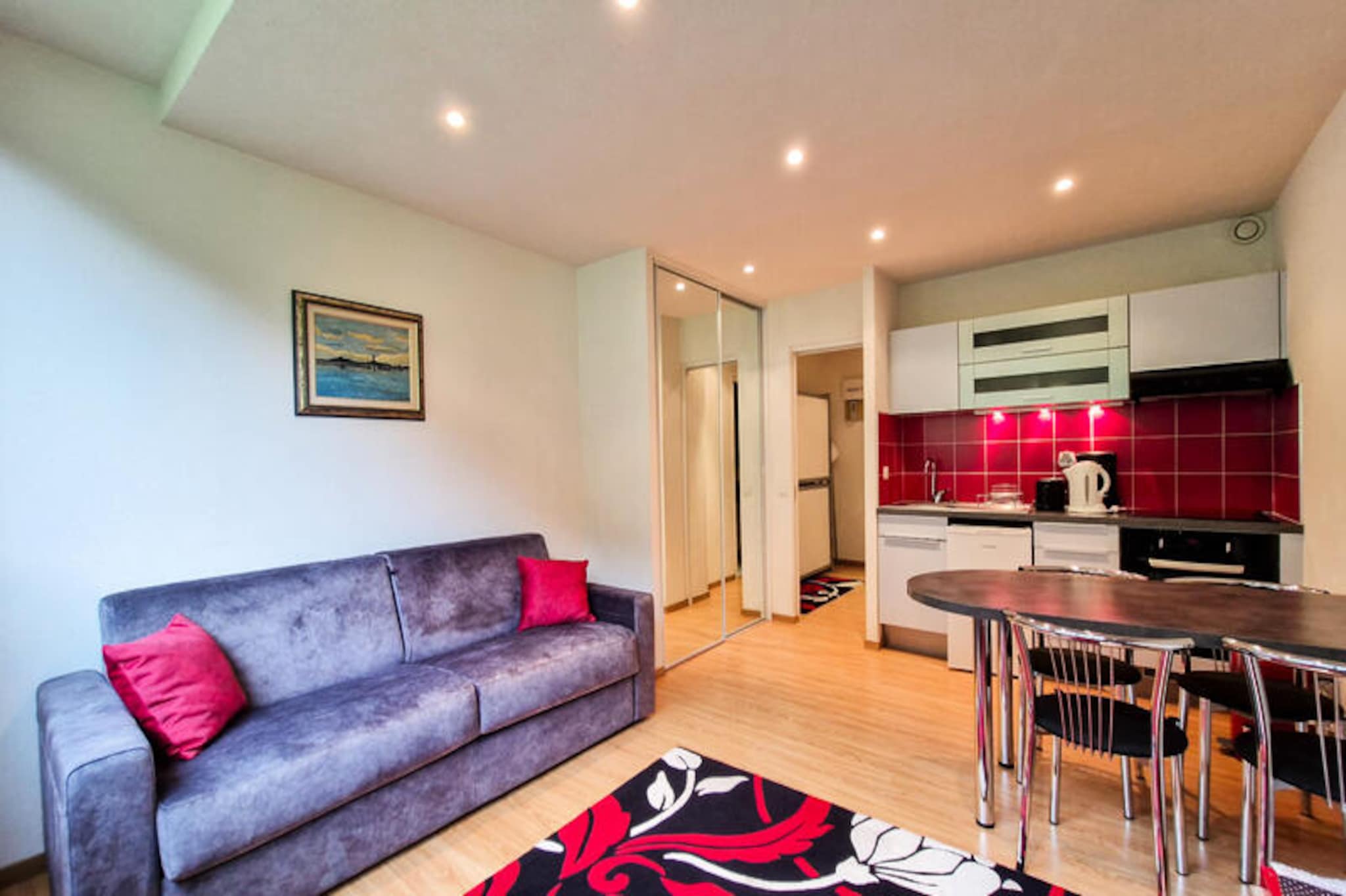 High above the serene Alpine valley, this charming studio in the Flaine Forêt district offers a cozy retreat for mountain enthusiasts. Located just 150 meters from the slopes and ski school meeting points, it’s the perfect base for both beginners and seasoned skiers. The surrounding area is vibrant yet peaceful, with shops and amenities just a short stroll away, ensuring convenience without compromising the tranquility of your stay. \n\nThis beautifully renovated 25 m² studio, situated on the 7th floor, is thoughtfully designed to maximize comfort and functionality. The warm parquet flooring creates a welcoming ambiance, while the clever layout accommodates up to four guests. The entrance features a set of bunk beds, while the living room includes a comfortable double sofa bed (160x190cm) and a flat-screen TV for relaxing evenings. The kitchenette is equipped with modern appliances, including four ceramic hobs and an oven, making it easy to prepare meals after a day on the slopes. The bathroom, complete with a shower and toilet, adds to the convenience. For your gear, a dedicated ski locker is provided, ensuring a clutter-free living space. \n\nBeyond the property, Flaine offers a wealth of activities year-round. In winter, the Grand Massif ski area beckons with its extensive slopes and breathtaking views. In summer, the included \