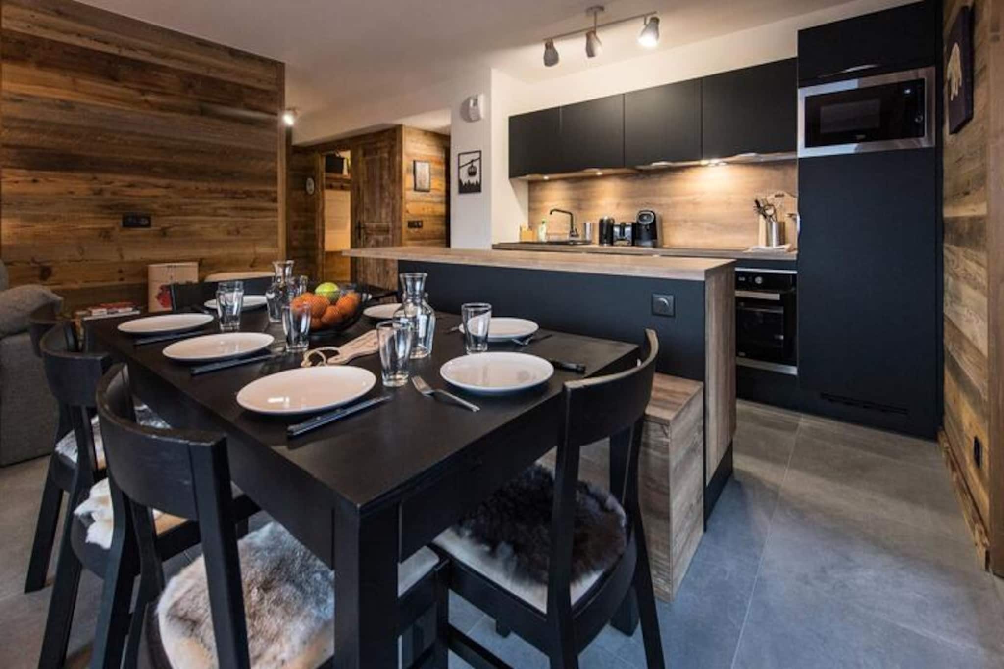 High in the French Alps at an altitude of 1950 meters, this exquisite apartment in the L'Olvera residence invites you to experience the perfect blend of luxury and alpine charm. Imagine mornings filled with crisp mountain air and breathtaking views from your spacious south-west facing terrace, followed by days of skiing directly from your doorstep or exploring scenic hiking trails. Whether you're seeking thrilling adventures or serene relaxation, this property offers an unparalleled mountain escape. \n\nDesigned with comfort and style in mind, the apartment accommodates up to eight guests, making it ideal for two families or a group of friends. The living area features a cozy seating space, a dining room, and a fully equipped kitchen with modern appliances, ensuring you have everything you need to prepare hearty meals after a day outdoors. Two elegant double bedrooms provide restful retreats, while two additional sleeping areas with bunk beds cater to younger guests. The apartment also boasts two shower rooms with WCs, ensuring convenience for all. For families with little ones, thoughtful baby equipment is provided, including a travel cot, high chairs, and even a steamer for baby food. \n\nAfter a day of skiing or hiking, unwind in the private jacuzzi on the terrace, soaking in the alpine ambiance. The residence offers practical amenities such as a ski locker with boot dryer, secure underground parking with an electric charging station, and Wi-Fi. Shops, restaurants, and bus stops are within easy reach, while nearby attractions include hiking trails and a municipal swimming pool. \n\nBooking with Altitude 1750 ensures a seamless experience, with ski passes and lesson cards delivered directly to the residence. Discounted rates on ski equipment and lift passes add to the convenience. Don't miss the chance to create unforgettable memories in this luxurious mountain retreat—reserve your stay today!