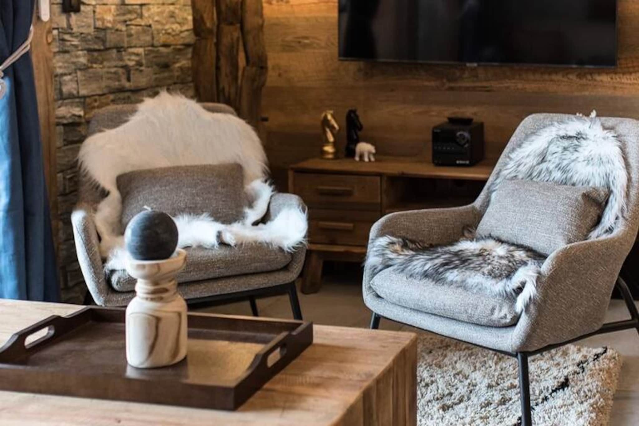 High above the serene alpine landscapes at 1950 meters, this luxurious apartment in the L'Olvera residence promises an unforgettable mountain retreat. Imagine waking up to crisp mountain air and stepping directly onto the slopes from your ski locker with boot dryer. With its prime location in Upper Valmeinier, you’re surrounded by charming shops, cozy restaurants, and breathtaking views that set the tone for a perfect holiday. Whether you’re here for thrilling ski adventures or tranquil hikes, this residence offers the ultimate blend of convenience and comfort. \n\nInside, the apartment boasts modern, welcoming decor and high-end amenities designed for relaxation. The spacious living room opens onto a stunning 42m² terrace, perfect for soaking in the alpine atmosphere. A fully equipped kitchen, complete with induction hob, oven, and microwave, invites you to prepare hearty meals after a day of adventure. The sleeping arrangements cater to families and groups, featuring a double bedroom with a plush 160x200 cm bed, a sleeping area with bunk beds, and another with a 140x190 cm bed. The sleek shower room includes a washing machine, and a separate toilet ensures privacy and convenience.\n\nBeyond the apartment, the location is a gateway to endless activities. Ski lessons and passes can be delivered directly to your residence, while discounted rates for equipment rental make planning effortless. In warmer months, explore nearby hiking trails or unwind at the municipal swimming pool. With Wi-Fi, reserved parking, and thoughtful touches like beds made upon arrival, every detail is crafted for your ease.\n\nThis property is more than a place to stay; it’s a haven for creating cherished memories. Whether you’re seeking adventure or relaxation, the L'Olvera residence invites you to experience the magic of the French Alps in unparalleled style.