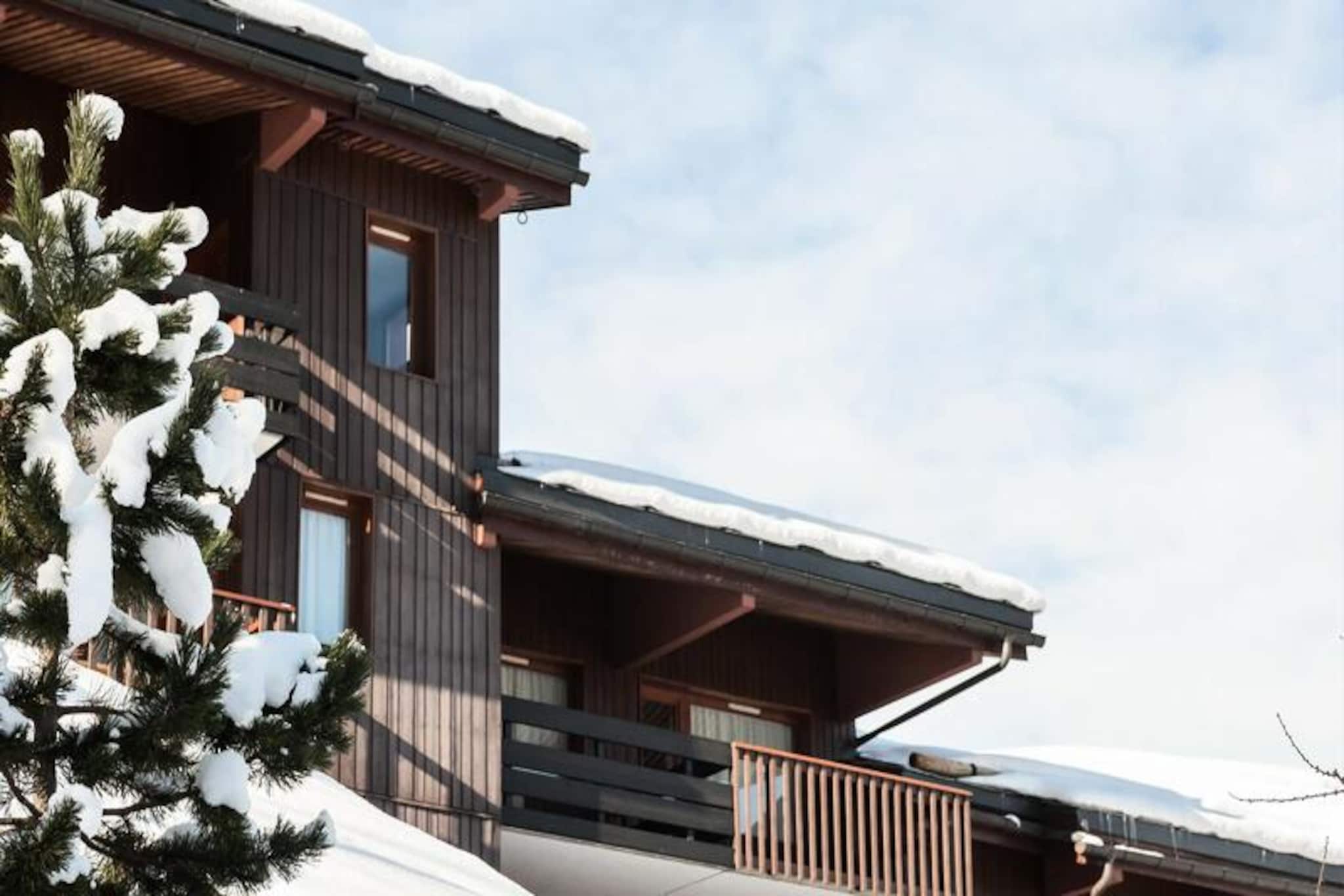 High above the charming village of Valmorel, a collection of traditional Savoyard-style chalets awaits, offering an authentic alpine retreat. These picturesque residences, nestled in the Crève Coeur district, exude warmth and character, with their wooden facades blending seamlessly into the surrounding mountain landscape. Imagine waking up to the crisp mountain air, the sound of snow crunching underfoot, and the promise of adventure just steps away. Whether you're here to carve through pristine slopes or simply soak in the serene beauty of the French Alps, this is the perfect base for your getaway.
Each chalet is thoughtfully designed to combine rustic charm with modern comfort. Your cozy 2-room apartment accommodates up to five guests and features a well-equipped kitchen, a comfortable living area, and a private bedroom. After a day on the slopes, unwind in the inviting ambiance of your home away from home, where every detail has been considered for your convenience. Additional amenities include WiFi, television, and the option to bring your furry friends along for the adventure.
The location is unbeatable for ski enthusiasts. With direct access to the Valmorel ski area and lifts just a short walk away, you can hit the slopes in no time. The Télébourg cable car connects you effortlessly to the heart of Valmorel, where you'll find a vibrant shopping street, cozy cafés, and restaurants serving delicious Savoyard specialties. In summer, the Pass'Aventure opens up a world of outdoor activities, from hiking to paragliding, ensuring year-round excitement.
Whether you're seeking thrilling winter sports or tranquil alpine escapes, these chalets in Valmorel promise unforgettable memories. Let the breathtaking views and welcoming atmosphere inspire your next adventure in the French Alps.