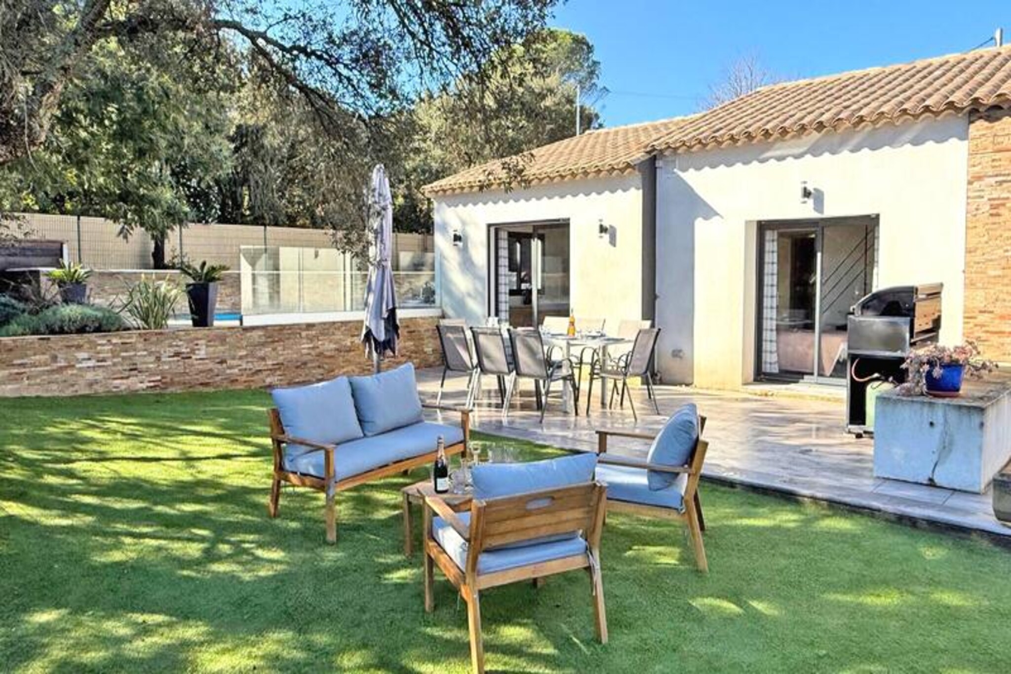 In the heart of the French Riviera, this charming 5-room villa offers a serene escape surrounded by the beauty of Provence. Set on a spacious 750 m² enclosed plot, this property is perfect for families or groups of friends seeking a peaceful retreat with modern comforts. The villa is nestled in a quiet residential area, just a short distance from the picturesque village of Plan de la Tour and the vibrant coastal town of Sainte-Maxime, offering the best of both worlds: tranquility and accessibility to the region's highlights.
Inside, the villa's air-conditioned interiors provide a cool and inviting atmosphere. The main house features two comfortable bedrooms, each with its own en-suite bathroom, and a mezzanine for additional sleeping space. The open-plan kitchen is fully equipped with modern appliances, making it easy to prepare delicious meals to enjoy in the dining area or on the terrace. The separate apartment adds extra privacy with its own kitchen, living area, bedroom, and mezzanine, accommodating up to eight guests in total. WiFi and fiber internet ensure you stay connected, while the cozy living spaces invite relaxation after a day of exploring.
Step outside to discover your private oasis. The 6.5x3m swimming pool, surrounded by sun loungers, is the perfect spot to soak up the Mediterranean sun. A boules pitch and a gas barbecue add to the outdoor entertainment options, while the shaded terrace offers a delightful space for al fresco dining. The secure driveway provides parking for up to five vehicles, ensuring convenience for all guests.
With the charming village of Plan de la Tour just 1,100 meters away, you can easily explore local shops, markets, and restaurants. The sandy beaches of Sainte-Maxime are only a 15-minute drive, offering endless opportunities for seaside relaxation and water activities. Whether you're savoring Provençal cuisine, strolling through vineyards, or enjoying the vibrant coastal life, this villa is your gateway to an unforgettable holiday in the South of France.