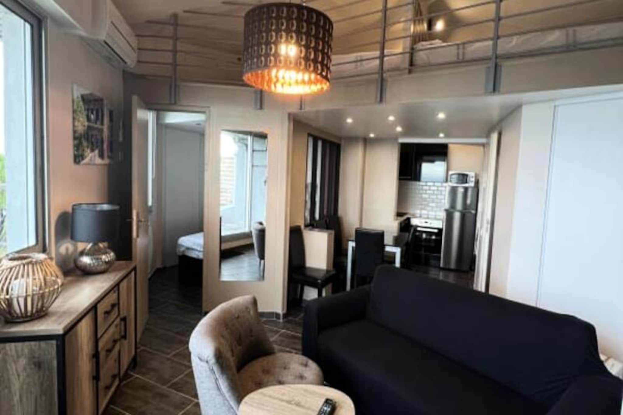 Perched on the top floor of a modern seaside residence, this charming one-bedroom apartment in Grau-du-Roi offers a serene escape with breathtaking sea views. The northwest-facing terrace is perfect for enjoying sunsets over the bay of Aigues-Mortes and La Grande-Motte, creating unforgettable moments of tranquility. Set in a peaceful yet central area, the property provides direct beach access through the garden, ensuring the ultimate convenience for seaside relaxation. Whether you’re strolling to nearby shops, markets, or tapas bars, everything you need is just a short walk away. \n\nInside, the apartment boasts a bright and modern living space designed for comfort. The fixed 160 cm bedding ensures restful nights, while the open-plan kitchen comes fully equipped with essentials like a washing machine, coffee maker, toaster, and oven. Reversible air conditioning adds to the comfort, making this retreat ideal year-round. The bathroom features a sleek shower and toilet, and guests are welcomed with a linen set and basic amenities for a hassle-free stay. \n\nThe residence, Château Leenhardt, offers private parking and elevator access, making it suitable for couples or small families seeking a convenient and stylish base. Nearby attractions include cycle paths to the Salins d'Aigues-Mortes, water sports, and excursions into the Camargue. For those seeking adventure, Espiguette and Port-Camargue beaches, Luna Park, and thalassotherapy centers are just minutes away. \n\nWith easy access to Montpellier, Nîmes, and Arles, this apartment is the perfect gateway to explore the beauty of southern France. Whether you’re here for the vibrant village life or the serene coastal charm, this property promises a memorable stay.