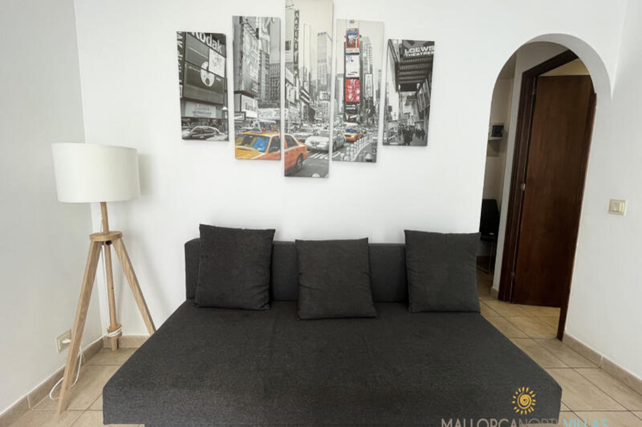 Just steps from the sparkling waters of Puerto de Pollença, this charming apartment offers a serene escape in one of Mallorca's most picturesque bays. Whether you're a couple seeking a romantic retreat, a family looking for a seaside adventure, or a cyclist eager to explore the scenic routes of the Sierra de Tramuntana, this property is perfectly tailored to your needs. The vibrant promenade, lined with crystal-clear beaches, inviting cafes, and local restaurants, is right at your doorstep, making every moment of your stay unforgettable. \n\nInside, the apartment exudes warmth and practicality. The cozy bedroom features a comfortable double bed and a ceiling fan, while the living room includes a sofa bed for additional guests. Air conditioning in the dining area ensures a pleasant atmosphere, even on the warmest days. The interiors are thoughtfully designed to provide a worry-free and relaxing experience, with all the essentials for a comfortable stay. For larger groups or families, the option to book additional apartments within the same building adds flexibility and convenience. \n\nCyclists will appreciate the easy access to breathtaking routes and secure bicycle storage, making this an ideal base for exploring Mallorca's stunning landscapes. Beyond the apartment, you'll find pristine beaches, beach clubs, and charming eateries that showcase the island's rich culinary heritage. With excellent connections to the island's key attractions, including the majestic Sierra de Tramuntana and the historic town of Alcúdia, this location is unbeatable. \n\nWhether you're here for adventure, relaxation, or a bit of both, this apartment in Puerto de Pollença offers the perfect blend of comfort, functionality, and prime location. Book now and create lasting memories in the heart of Mallorca's natural beauty.