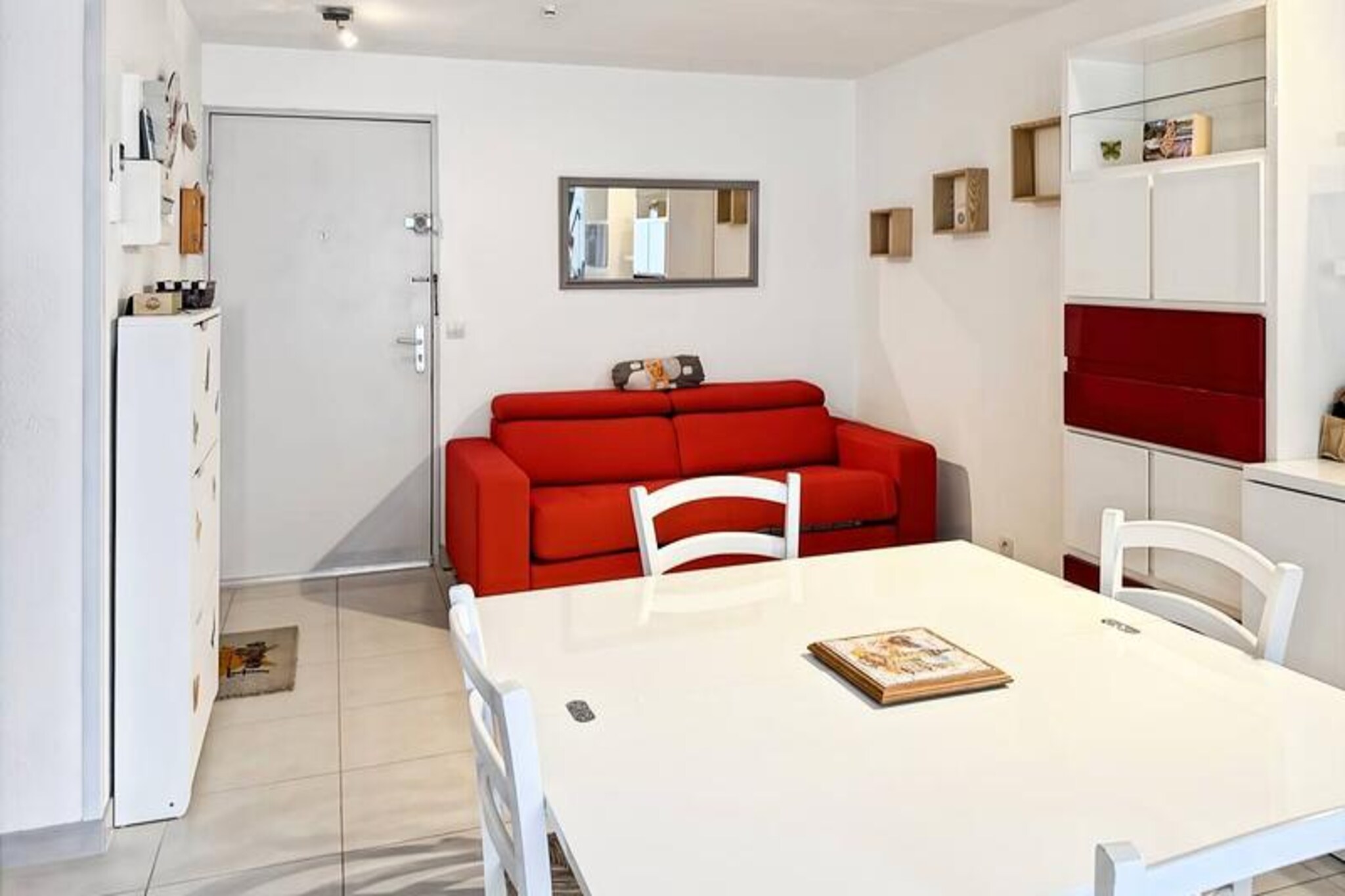 Where the shimmering Mediterranean meets the wild beauty of the Camargue, this charming apartment in Grau-du-Roi offers a serene escape for travelers seeking relaxation and adventure. Imagine waking to the gentle sea breeze and the vibrant hues of the lagoon, ready to explore the unique blend of nature and culture that surrounds you. This cozy retreat is your gateway to the enchanting landscapes of southern France. \n\nTastefully renovated, the 25m² apartment boasts a modern and bright interior designed to maximize comfort. The air-conditioned space includes a welcoming bedroom with a plush double bed and a sofa bed in the living area, accommodating up to four guests. The fully equipped kitchen invites you to prepare delicious meals, while the secure residence features a refreshing swimming pool for moments of pure relaxation. With private parking and thoughtful amenities, this haven is perfect for couples or small families. \n\nStep outside and discover the vibrant charm of Grau-du-Roi, with its local shops, restaurants, and picturesque streets just a short walk away. The region is a paradise for nature lovers, offering stunning trails through the Camargue’s marshlands, home to flamingos and wild horses. The Mediterranean coastline beckons with sandy beaches and crystal-clear waters, ideal for sunbathing or water sports. \n\nWhether you’re drawn to the tranquility of the lagoon or the lively energy of the town, this apartment provides the perfect base for unforgettable memories. Let the magic of Grau-du-Roi captivate your heart and soul.