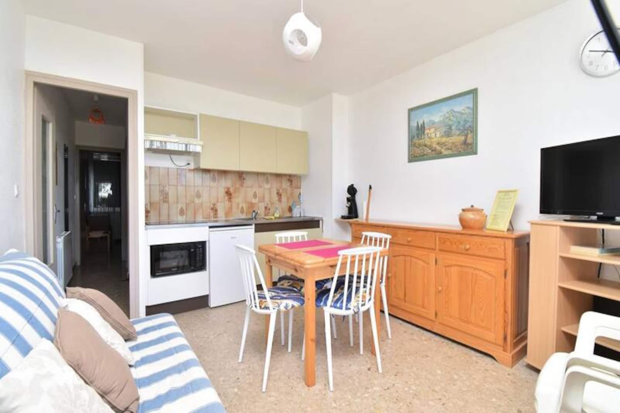 In the serene Le Vincent residence, this charming apartment offers a delightful retreat just moments from the vibrant town center and the golden sands of Grau du Roi. Imagine waking up to the gentle Mediterranean breeze, stepping into your private garden, and sipping your morning coffee surrounded by lush greenery. This 48m² haven perfectly combines tranquility and convenience, making it an ideal choice for families, couples, or friends seeking a relaxing getaway. \n\nInside, the apartment boasts a bright and inviting living space with a modern kitchen seamlessly opening into the main room. The bedroom features a comfortable double bed and bunk beds, perfect for accommodating both adults and children. The recently renovated bathroom ensures a touch of luxury with all the modern comforts you need. With private parking available, you can leave your car behind and explore the area on foot or by bike.\n\nJust a 5-minute stroll takes you to the heart of Grau du Roi, where you can enjoy charming shops, local markets, and a variety of dining options. A short 6 km drive leads to the medieval town of Aigues-Mortes, a treasure trove of history and culture. For nature enthusiasts, the nearby Camargue region offers breathtaking landscapes of marshes, ponds, and wetlands, best explored by electric bike. Witness the iconic pink flamingos, white horses, and majestic bulls in their natural habitat.\n\nWhether you're here to relax by the beach, immerse yourself in Provence's rich heritage, or embark on outdoor adventures, this apartment provides the perfect base for unforgettable memories. Your Mediterranean escape awaits!
