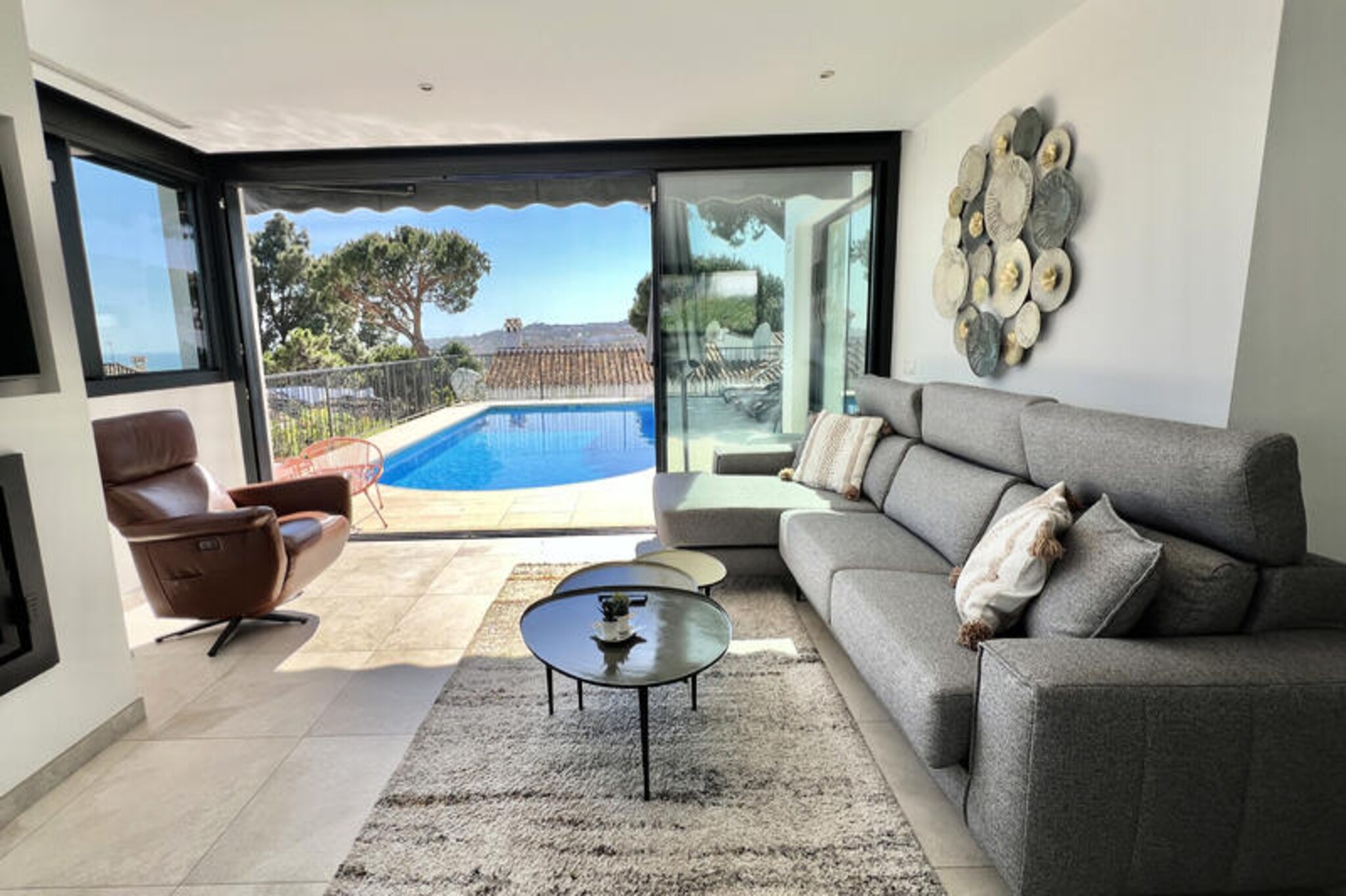 Basking in the golden rays of the Costa del Sol, this stunning villa in La Cala de Mijas offers an idyllic retreat for those seeking both tranquility and vibrant local charm. Just a short stroll from the picturesque village, this property invites you to immerse yourself in the Mediterranean lifestyle, surrounded by sun-drenched terraces and the soothing sound of the sea breeze. Whether you're lounging by the private pool or exploring the nearby cobblestone streets, every moment here feels like a dream come true.
The villa, all on one level, boasts a contemporary design following a complete renovation in 2023. The open-plan living area, with its fully equipped modern kitchen, flows seamlessly onto the terrace through large sliding glass doors, creating a perfect blend of indoor and outdoor living. The three spacious bedrooms, each with fitted wardrobes, provide restful havens, while the two bathrooms, including a luxurious master en-suite with a bathtub and walk-in shower, ensure ultimate comfort for your stay. Thoughtful touches like a welcome pack of essentials add to the ease and relaxation of your holiday.
La Cala de Mijas, a beloved gem of the Costa del Sol, is just minutes away. Here, you'll find a delightful mix of traditional and international restaurants, charming streets, and a beachfront promenade that stretches for miles. Leave the car behind and enjoy the convenience of having everything within walking distance. Whether you're savoring local cuisine, shopping at the markets, or simply soaking in the coastal beauty, this destination offers something for everyone.
With its unbeatable location, modern comforts, and serene ambiance, this villa is the perfect choice for an unforgettable Mediterranean escape. Let the allure of La Cala de Mijas and the Costa del Sol captivate you, creating memories to last a lifetime.