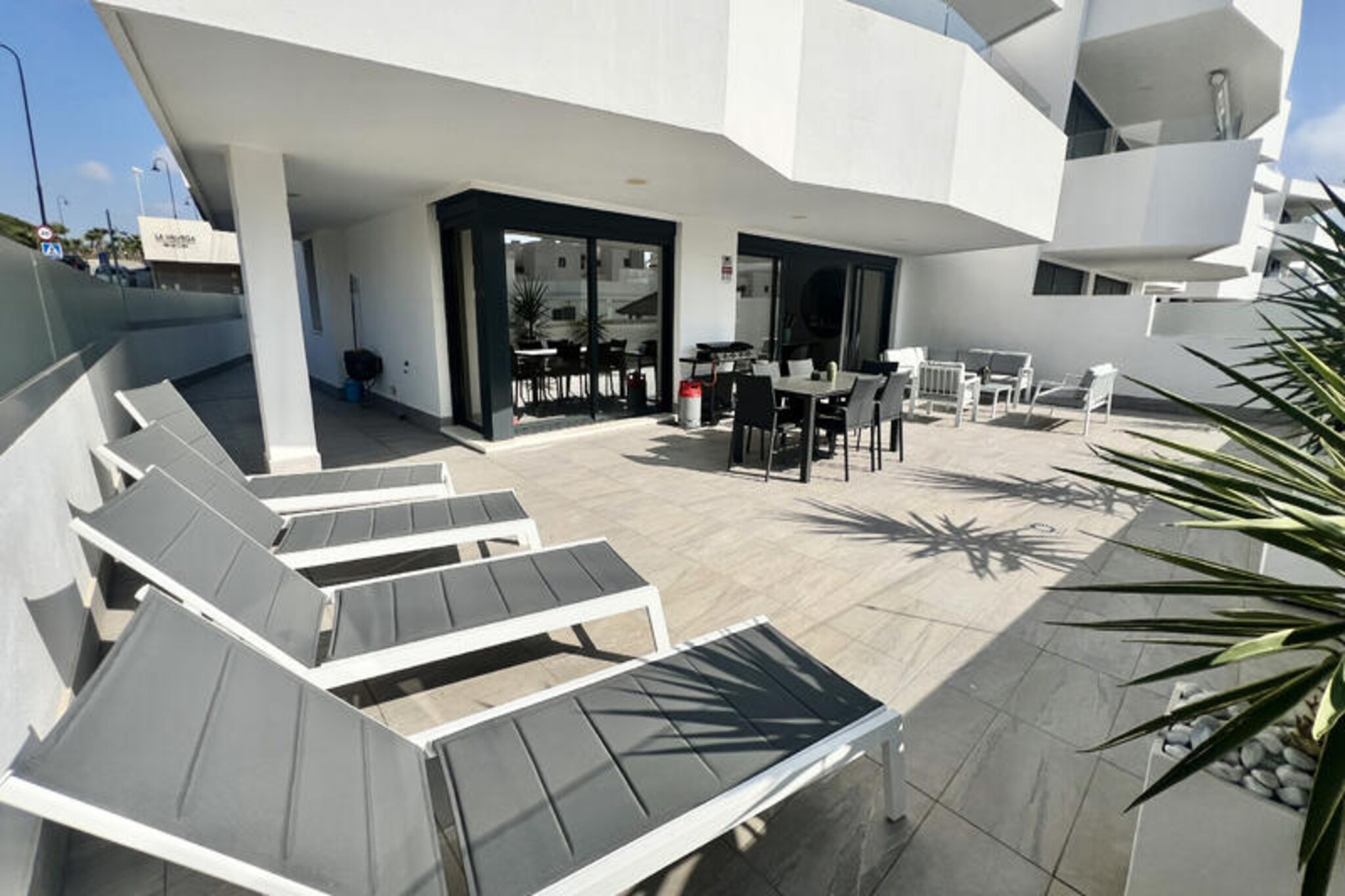 In the heart of the vibrant town of La Cala, this sophisticated apartment in the exclusive Dream Gardens development offers a luxurious retreat just steps away from the golden sands of the Costa del Sol. Surrounded by the charm of Andalusian culture and the soothing Mediterranean breeze, this property invites you to experience the perfect blend of relaxation and modern comfort. Whether you're seeking a tranquil getaway or an active holiday, this apartment is your gateway to unforgettable moments.
The spacious interior boasts an open-plan living and dining area that seamlessly connects to a fully equipped kitchen, making it ideal for entertaining or enjoying quiet family meals. The master suite features a private bathroom with both a bathtub and shower, as well as a dressing room for added convenience. Two additional bedrooms, one with an en-suite bathroom, ensure comfort and privacy for all guests. Step outside to the expansive terrace, complete with a covered area, sun loungers, and a gas grill, where you can soak up the sun or dine alfresco under the stars.
The Dream Gardens complex offers an array of premium amenities, including a large outdoor pool open seasonally, a gym, a children's playroom, and a table tennis room. During the cooler months, indulge in the indoor pool, hammam, and sauna. With Wi-Fi access and secure underground parking, every detail has been considered for your convenience. The picturesque village of La Cala de Mijas, with its stunning beaches and vibrant local life, is just 500 meters away, while a supermarket is conveniently located across the street.
Whether you're drawn by the allure of the Mediterranean, the rich culture of Andalusia, or the comfort of a modern retreat, this apartment promises a memorable stay. Relax, explore, and create lasting memories in this idyllic coastal haven.