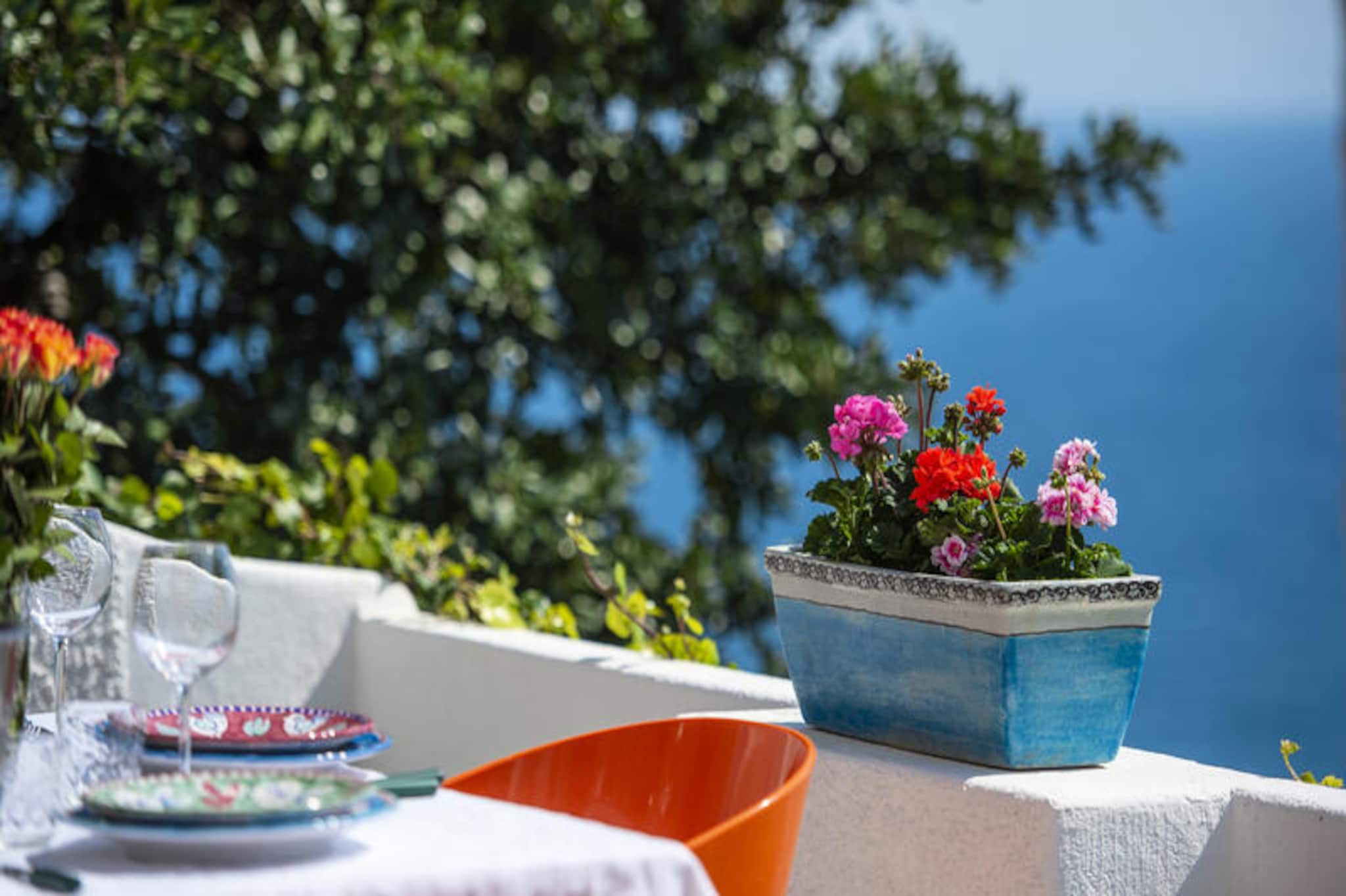 Perched on the rocky spit of Capo di Conca, Casa Giovannina offers a unique blend of coastal charm and breathtaking Mediterranean views. This traditional fisherman's cottage invites you to experience the serene beauty of the Amalfi Coast, away from the bustling crowds yet perfectly positioned to explore its iconic landmarks. Imagine waking up to the gentle sound of waves and enjoying your morning coffee on one of the two panoramic terraces overlooking the endless blue sea. Here, tranquility meets timeless Italian allure.  
                        The property is thoughtfully designed on a single floor, offering a cozy yet spacious layout. The large terrace is equipped with a barbecue, pizza oven, and outdoor furniture, perfect for al fresco dining or relaxing under the sun. Inside, the living room features a dining area and a double sofa bed, while the open veranda provides a scenic spot for meals or unwinding. The fully equipped kitchen, though without a dishwasher, ensures all your culinary needs are met. The double bedroom opens directly onto the patio with stunning sea views, complemented by a single bedroom and a bathroom with a large shower.  
                        Casa Giovannina’s location is ideal for exploring the Amalfi Coast. A short walk takes you to the SITA bus stop for Amalfi and Positano, Capo di Conca Beach Club, and two delightful local restaurants. The famous Emerald Grotto is also nearby, offering a magical experience of natural beauty. While parking can be challenging during high season, the property is easily accessible by foot or scooter.  
                        Whether you’re seeking a romantic getaway or a peaceful retreat, Casa Giovannina promises an unforgettable stay with its panoramic vistas, authentic charm, and proximity to the best of the Amalfi Coast.