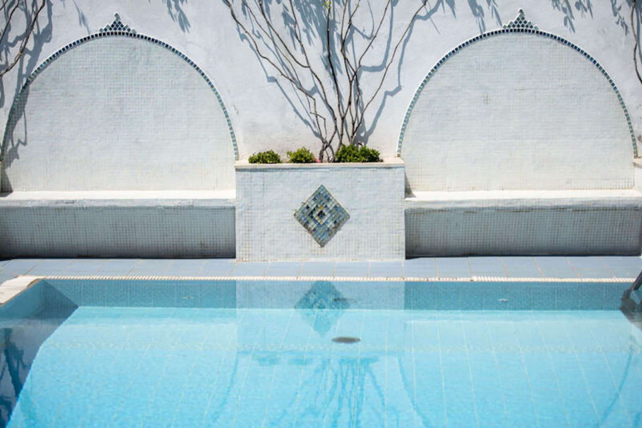 Perched above the shimmering waters of Marmorata Bay, Villa Arte offers a timeless escape in the heart of the Amalfi Coast. Just a short walk from Minori and minutes from Ravello, this historic villa combines Mediterranean charm with modern luxury, creating an unforgettable setting for your Italian getaway. Imagine waking up to panoramic sea views, basking in the golden sunshine, and relaxing by the private pool surrounded by a lush rooftop garden. Every moment here feels like a celebration of beauty and tranquility. \n\nSpanning 300 square meters on a single level, the villa is thoughtfully designed for comfort and elegance. The Mediterranean-style roof garden features a solarium and a spacious pool, perfect for unwinding or hosting special events. Inside, the villa boasts a stylish living and dining area with direct access to the garden, a fully equipped kitchen, and three luxurious suites, each with breathtaking sea views. The master suite includes a jacuzzi, while the bathrooms are adorned with hand-painted Vietri ceramics and chromotherapy showers, adding a touch of artistry to your stay. Modern amenities such as air conditioning, Wi-Fi, Smart TVs, and USB ports ensure a seamless experience. \n\nStep outside and discover the vibrant surroundings. Restaurants, bars, shops, and beaches are all within walking distance, while the nearby Minori Port offers direct connections to Amalfi and Positano. Explore the iconic towns of Ravello and Amalfi, both just a short drive away, or simply soak in the enchanting sunsets from the villa’s terrace. Whether you’re seeking relaxation, adventure, or a romantic retreat, Villa Arte is your gateway to the magic of the Amalfi Coast.