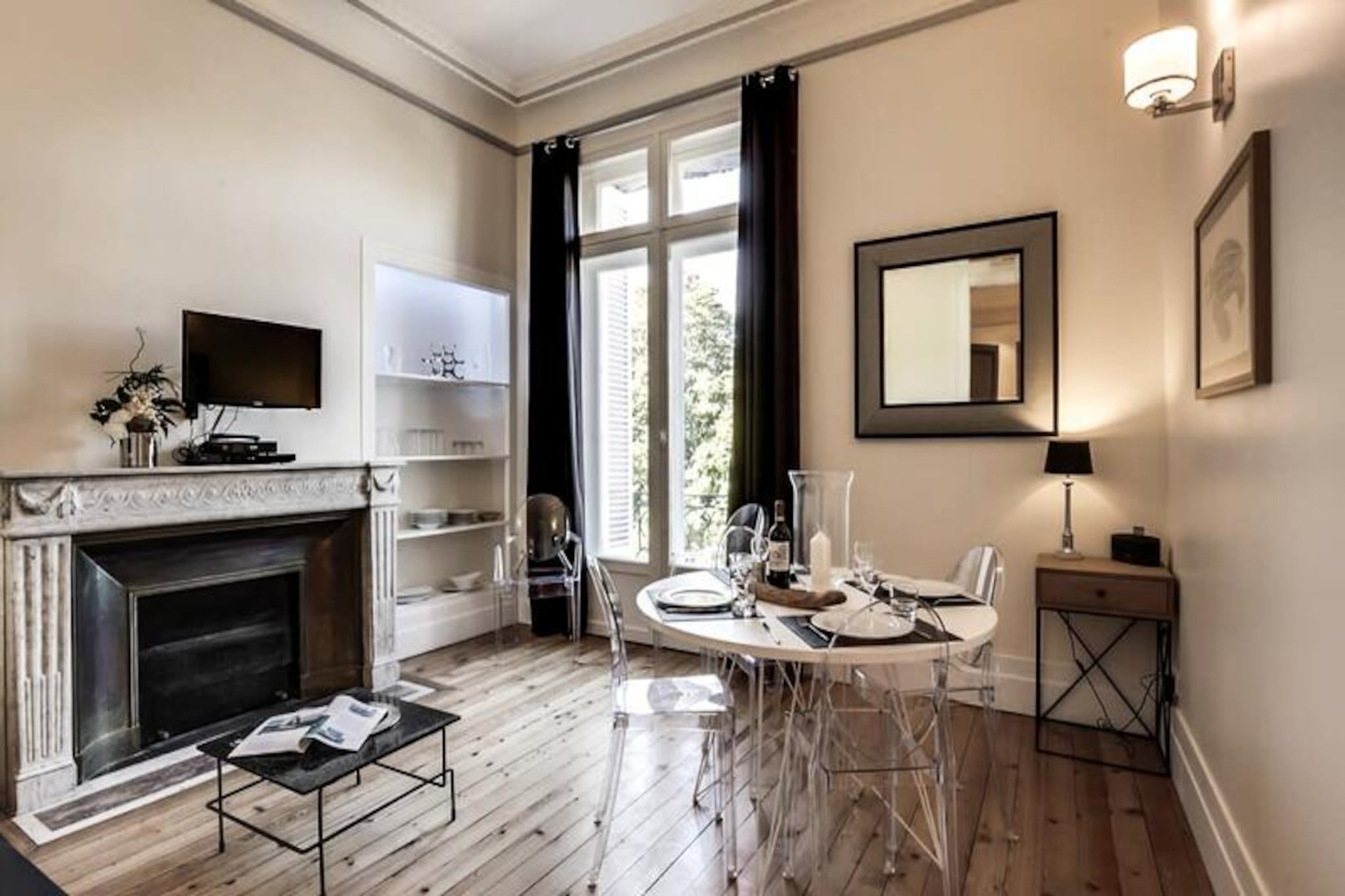 In the heart of Bordeaux, where history and modernity intertwine, this elegant 70m² apartment offers a refined retreat for your city escape. Located on the second floor of a charming building without an elevator, it places you steps away from iconic landmarks such as Place de la Bourse, the Miroir d’Eau, and the vibrant Saint-Pierre district. Imagine starting your day with a stroll through the picturesque streets, soaking in the rich culture of this UNESCO World Heritage city. 

The apartment boasts two spacious double bedrooms, each with its own en-suite bathroom—one featuring a shower and the other a bathtub—offering both comfort and privacy. The bright living area invites relaxation, with a cozy sofa bed, a large television, and high-speed WiFi for your convenience. The open-plan kitchen is fully equipped, including a dishwasher, Nespresso coffee machine, and washer-dryer, ensuring a seamless stay whether you’re here for leisure or business.

Step outside and immerse yourself in the dynamic Place Gambetta neighborhood, surrounded by chic boutiques, gourmet restaurants, and lively cafés. From here, you can easily explore Bordeaux’s treasures, from the bustling Rue Sainte-Catherine to the architectural marvels of the Grand Théâtre and Saint-André Cathedral. For wine enthusiasts, the Cité du Vin is just a short tram ride away, offering an unforgettable journey into the world of Bordeaux wines.

With its prime location and thoughtful amenities, this apartment is your gateway to experiencing the charm, elegance, and vibrant lifestyle of Bordeaux. Whether you’re savoring local delicacies, exploring historic landmarks, or simply relaxing in the serene green spaces of Place Gambetta, your stay promises to be nothing short of extraordinary.