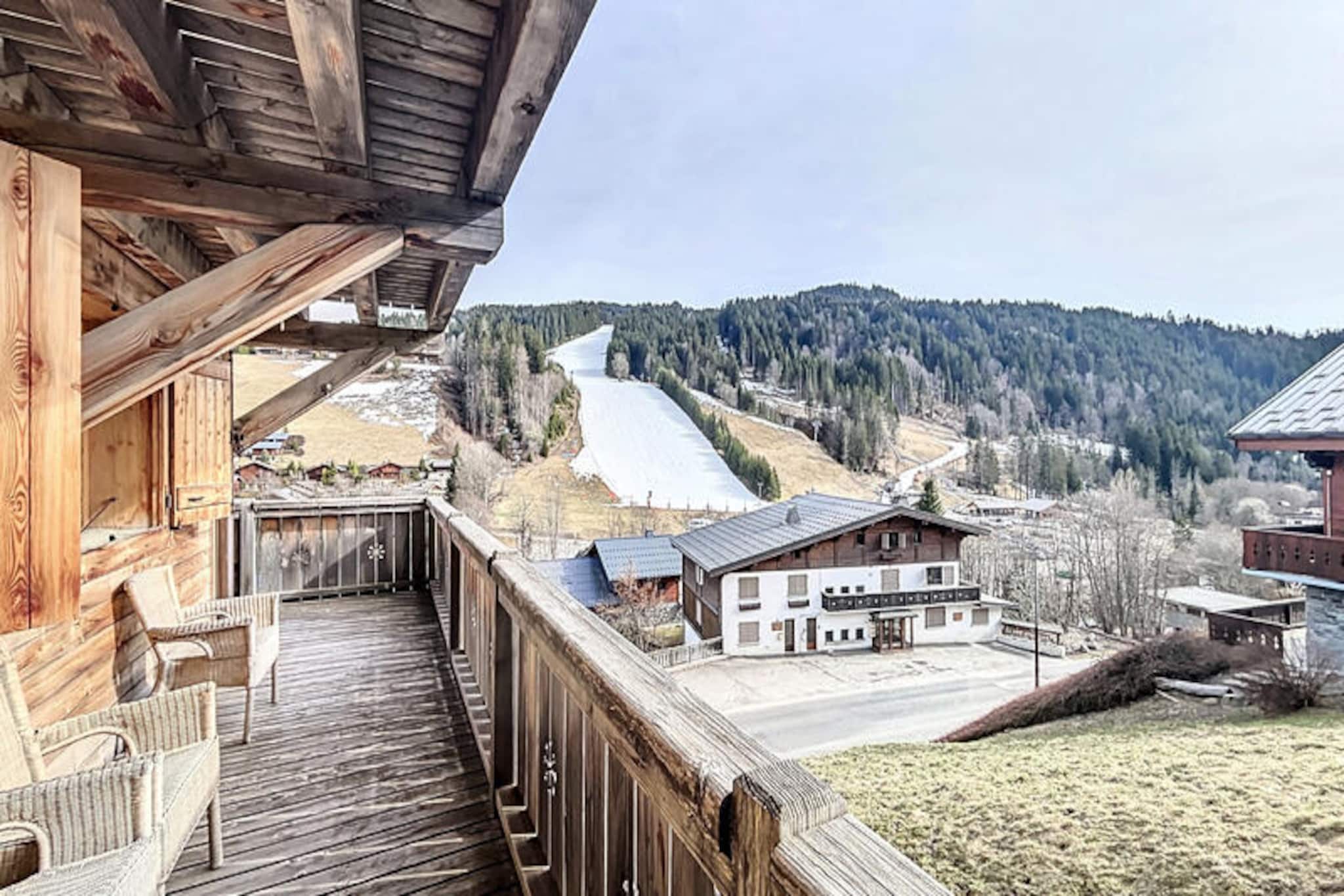 In the heart of the picturesque Perrières neighborhood of Les Gets, this recently built apartment invites you to experience the perfect alpine getaway. With its modern design and warm ambiance, it’s the ideal retreat for families or groups of friends seeking both adventure and relaxation in the French Alps. From the moment you arrive, you’ll be captivated by the stunning views and the serenity of this sought-after location.
The apartment boasts a spacious layout with a bright and airy living area that opens onto a magnificent sunny balcony overlooking the slopes. Here, you can sip your morning coffee while soaking in the crisp mountain air or unwind with a glass of wine as the sun sets over the peaks. The fully equipped kitchen allows you to prepare hearty meals after a day of exploration, while the cozy bedrooms ensure restful nights. Modern amenities like WiFi and a flat-screen TV provide all the comforts of home, making your stay as convenient as it is memorable.
Situated just a stone’s throw from the ski slopes, this property offers unparalleled access to Les Gets’ renowned skiing and snowboarding terrain. In the warmer months, the area transforms into a haven for hikers and mountain bikers, with trails that wind through breathtaking alpine landscapes. The vibrant village center is also within easy reach, offering a charming array of shops, restaurants, and entertainment options to enhance your stay.
Whether you’re carving through fresh powder in winter or exploring lush green trails in summer, this apartment provides the perfect base for an unforgettable mountain escape. Let the beauty of Les Gets and the comfort of this exceptional property create memories you’ll cherish forever.