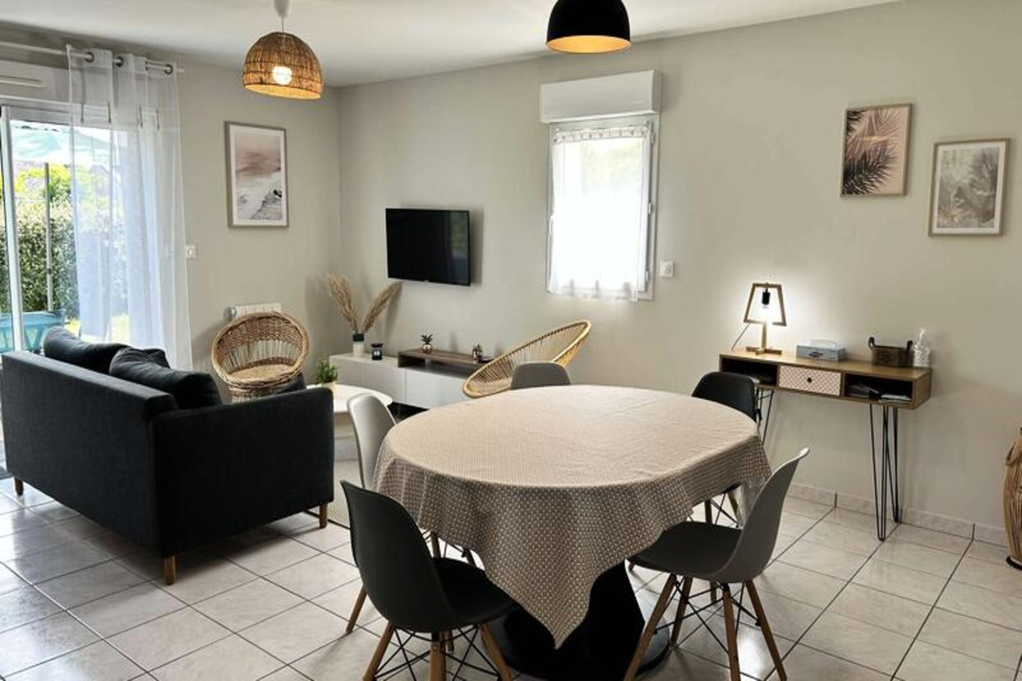 Just steps away from the renowned Pléneuf-Val-André Golf Course, this charming semi-detached house offers a serene retreat in a private estate with access to a shared indoor swimming pool. Perfectly situated for both relaxation and adventure, this property invites you to unwind amidst the beauty of Brittany’s coastline while enjoying modern comforts and proximity to the Vallées beach. Whether you're a golf enthusiast or simply seeking a peaceful getaway, this home provides the ideal setting for unforgettable moments. \n\nSpanning 57m², the house is thoughtfully designed for comfort and practicality. The ground floor features a spacious and sunlit living room with a cozy lounge area, complete with a sofa, armchairs, and TV, as well as a dining space for up to five guests. The open-plan kitchen is fully equipped with everything you need, including a gas hob, oven, microwave, refrigerator-freezer, dishwasher, and coffee machines for your morning brew. Upstairs, you'll find two inviting bedrooms: one with a queen-size bed and the other with a double bed and an additional single bed, making it ideal for families or small groups. A modern bathroom with a shower and washing machine adds convenience to your stay. Wi-Fi access and free parking in front of the house are included, ensuring a hassle-free experience. \n\nBeyond the property, the surrounding area is brimming with attractions. Tee off at the nearby golf course, stroll along the sandy shores of Vallées beach, or explore the charming villages and scenic trails of Brittany. The estate’s shared indoor pool is perfect for a refreshing dip during summer, while the region’s rich cultural heritage and culinary delights promise endless discoveries. \n\nWhether you’re here for a golfing holiday, a seaside escape, or simply to relax in comfort, this delightful house is your gateway to the best of Brittany. Book your stay and create lasting memories in this idyllic setting.