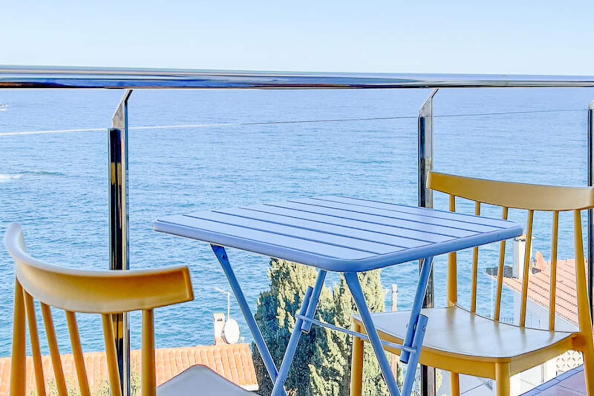 Where the azure waters of the Mediterranean kiss the shores of Costa Brava, Els Quatre Llops offers a tranquil retreat in the charming village of Llançà. This delightful apartment invites you to immerse yourself in the serene beauty of coastal Spain, just minutes from the golden sands of El Cau del Llop beach. Imagine waking up to the gentle sea breeze and the promise of a day filled with relaxation and exploration in one of the region's most picturesque settings. \n\nStep inside and discover a space designed for comfort and ease. The bright and airy living-dining room welcomes you with natural light streaming through its windows, creating a warm and inviting atmosphere. The apartment features two cozy bedrooms with double beds, a fully equipped kitchen complete with modern appliances, and a bathroom with all the essentials, including a bathtub with shower. Every detail has been thoughtfully curated to ensure your stay is as comfortable as possible. \n\nThe quiet street where the property is located offers a peaceful ambiance, perfect for unwinding after a day of adventure. Llançà itself is a gem of the Alt Empordà region, boasting a lively port area, charming medieval streets, and a rich cultural heritage. From local restaurants serving fresh seafood to quaint cafés and shops, everything you need is within easy reach. \n\nBeyond Llançà, the wonders of Costa Brava await. Explore the breathtaking Cap de Creus Natural Park, visit the artistic haven of Cadaqués, or delve into the surreal world of Salvador Dalí at his museum in Figueres. Whether you’re hiking the scenic Camí de Ronda trails or sipping wine at a nearby vineyard, Els Quatre Llops is your gateway to unforgettable Mediterranean moments.