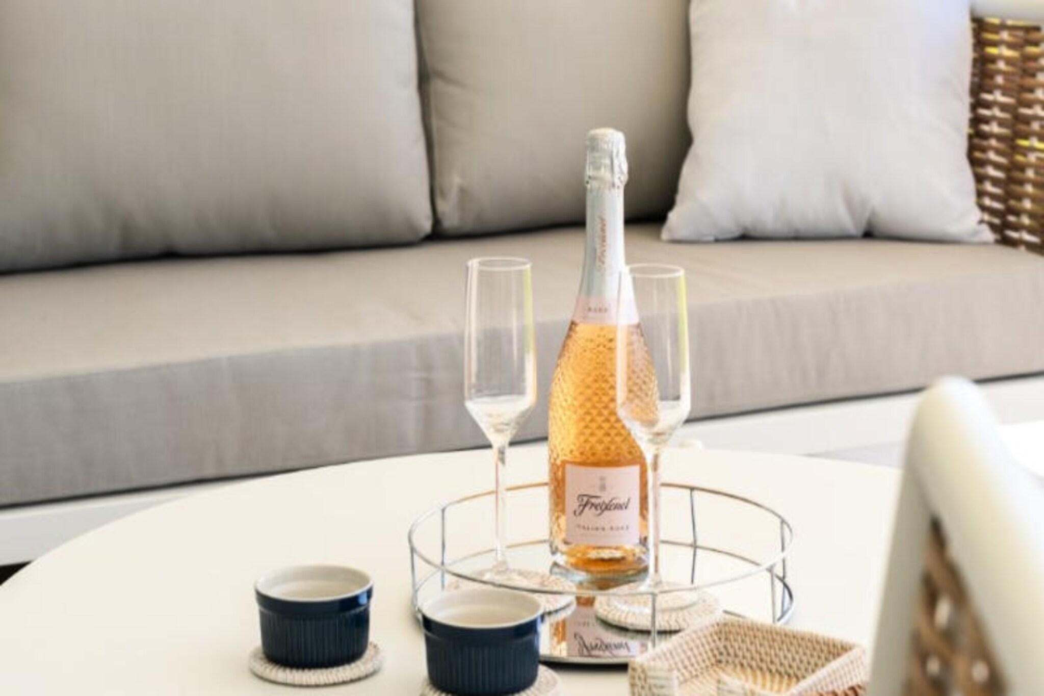Imagine waking up to the gentle rustle of palm trees and the shimmering waters of Europe’s first Crystal Lagoon just steps away. This exceptional apartment in Casares/Estepona invites you to experience the Costa del Sol like never before, blending modern comfort with the allure of Mediterranean living. Surrounded by 40,000 m² of lush tropical gardens, the property offers a serene retreat while being perfectly positioned for adventure and relaxation alike. Whether you’re lounging on the private sandy beach or exploring the nearby Sierra Crestellina Natural Park, every moment here feels like a dream come true. \n\nDesigned to accommodate up to six guests, this spacious apartment boasts three elegant bedrooms, a private garden, and a terrace furnished for outdoor dining and relaxation. The fully equipped kitchen includes modern appliances such as a Nespresso machine and dishwasher, ensuring convenience throughout your stay. With air conditioning, high-speed Wi-Fi, and a Smart TV offering international channels, the apartment is tailored for comfort and entertainment. Guests also enjoy access to shared amenities, including a swimming pool, children’s play area, and on-site parking. \n\nThe location is a golfer’s paradise, with Estepona Golf just 1 kilometer away and several prestigious courses within a short drive. For beach lovers, the sandy shores of Estepona and Duquesa are only minutes away, offering seaside dining and vibrant Andalusian charm. The nearby Alcazaba Lagoon Restaurant serves Mediterranean cuisine, while the lively town center of Estepona is perfect for exploring local boutiques and traditional tapas bars. \n\nWhether you’re seeking tranquility by the lagoon, thrilling outdoor activities, or the rich cultural heritage of the Costa del Sol, this property offers an unforgettable escape. Let the beauty of Casares and Estepona inspire your next holiday adventure.