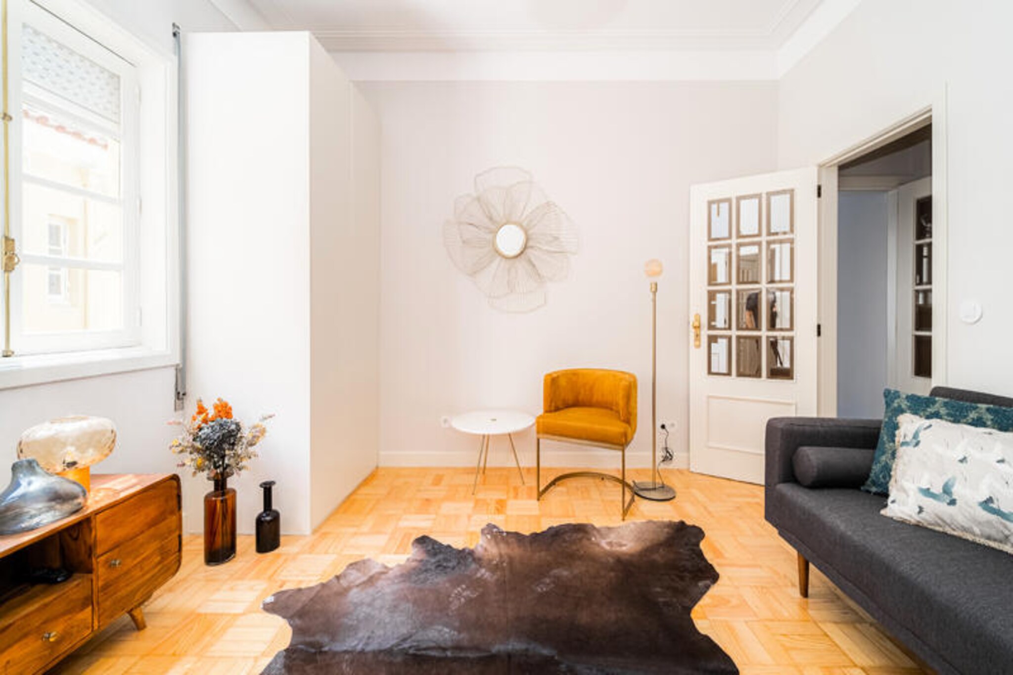 In the heart of Porto’s vibrant cityscape, this charming apartment offers a perfect blend of comfort and convenience for your urban getaway. Surrounded by the historic charm of Santo Ildefonso, this spacious retreat invites you to immerse yourself in the rich culture, delectable cuisine, and lively atmosphere of one of Portugal’s most beloved cities. Whether you’re strolling along the cobblestone streets or savoring a pastel de nata at a nearby café, every moment here feels like a celebration of Porto’s unique spirit. \n\nThe apartment spans 100 m² and comfortably accommodates up to six guests across three well-appointed bedrooms. Designed with both style and functionality in mind, it features a separate fully equipped kitchen with modern appliances, including an induction hob, refrigerator, dishwasher, and coffee maker. The living space is enhanced by amenities such as Wi-Fi, a flat-screen TV, and electric heating, ensuring a cozy and connected stay. For added convenience, a washing machine, dryer, and ironing facilities are also available, making it ideal for longer stays or family vacations.\n\nStep outside, and you’ll find yourself just moments from Porto’s most iconic landmarks. The Bolhão metro station is a mere 270 meters away, connecting you effortlessly to the city’s treasures. Explore the historic São Bento train station, the picturesque Douro River, or the bustling Mercado do Bolhão, all within walking distance. For food lovers, the area is a paradise with renowned eateries like Restaurante Cunha and Negra Café Baixa just steps away. The golden sands of Matosinhos Beach and the serene Lago dos Meninos are also a short drive away, offering a tranquil escape from the city buzz.\n\nWhether you’re here to explore Porto’s rich history, indulge in its culinary delights, or simply relax in a stylish and central setting, this apartment provides the perfect base for an unforgettable stay. Let the charm of Porto captivate you as you create memories that will last a lifetime.