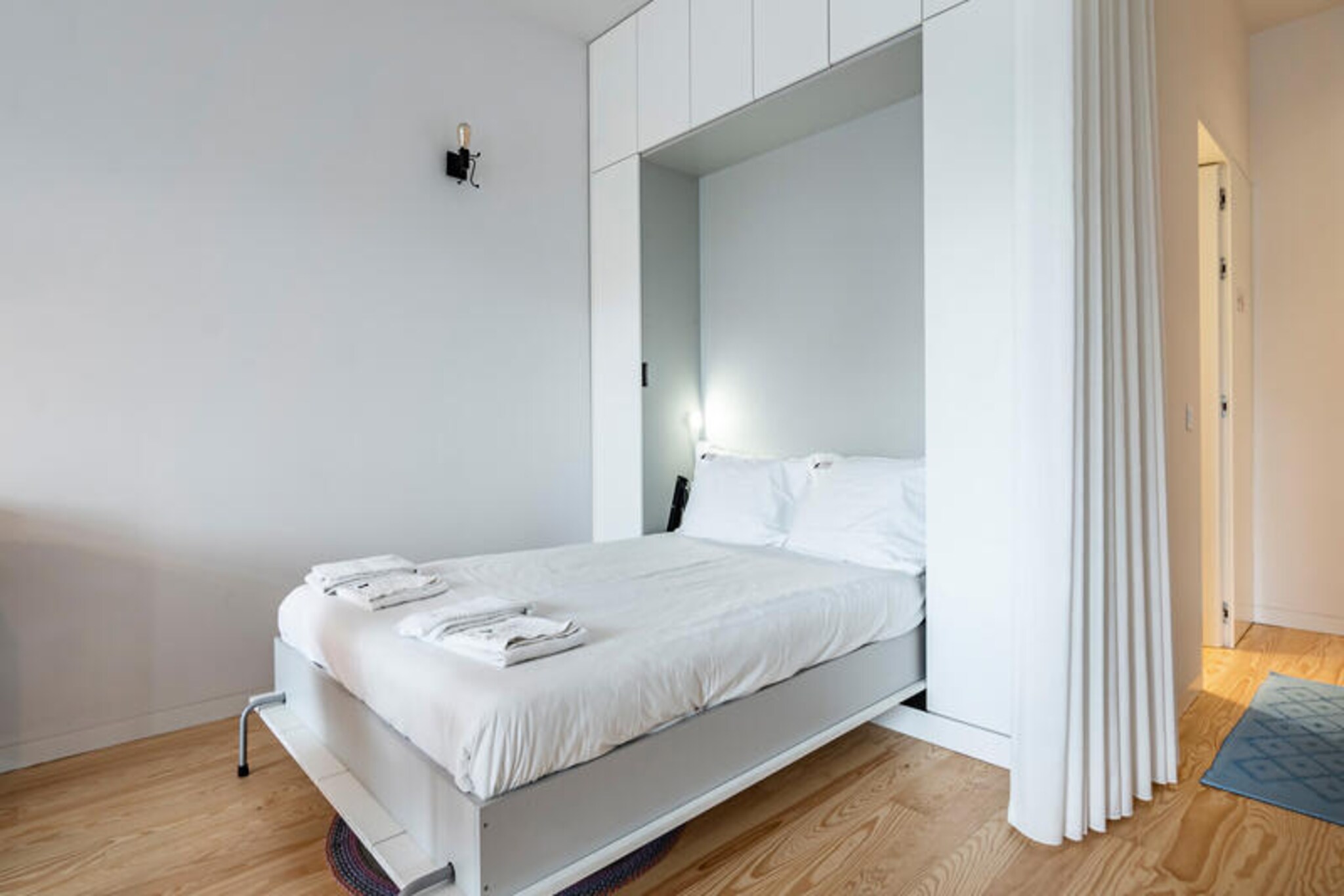 In the heart of Porto, where cobblestone streets meet the gentle hum of modern city life, this stylish studio apartment offers a serene retreat for two. With its tranquil garden views and central location, it’s the perfect blend of urban convenience and peaceful charm. Whether you’re here to explore Porto’s historic treasures or simply unwind, this cozy haven provides an ideal base. 

Step inside this beautifully designed 52 m² studio and discover a space that feels both contemporary and welcoming. The apartment is equipped with all the essentials to make your stay comfortable, including air conditioning, Wi-Fi, a flat-screen TV with satellite channels in multiple languages, and a fully equipped open-plan kitchen with a ceramic hob, dishwasher, and coffee maker. The balcony invites you to enjoy a quiet morning coffee or an evening glass of wine while overlooking the lush greenery below. Thoughtful touches like a washing machine, iron, and hairdryer ensure a hassle-free experience. 

Located in a quiet yet central area, you’ll find yourself within easy reach of Porto’s iconic landmarks, vibrant markets, and charming cafes. Take a leisurely stroll to the Ribeira district, marvel at the stunning azulejo tiles of São Bento Station, or indulge in a glass of Port wine by the Douro River. For those seeking a mix of culture, gastronomy, and relaxation, this studio is your gateway to the best of Porto. 

Whether you’re a couple on a romantic getaway or a solo traveler seeking inspiration, this apartment offers a perfect blend of comfort and location, inviting you to create unforgettable memories in one of Portugal’s most enchanting cities.