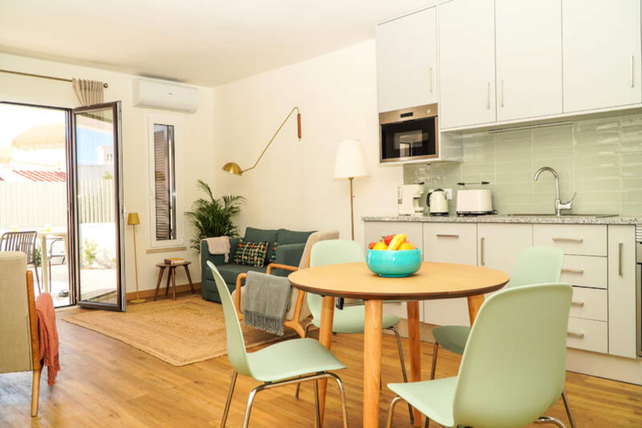 In the heart of Albufeira, where golden beaches meet the vibrant charm of the Algarve, this cozy apartment offers a serene retreat for up to three guests. Whether you're seeking a romantic getaway or a peaceful escape, this property is perfectly positioned to immerse you in the beauty and culture of southern Portugal. Wake up to the gentle rustle of palm trees and the promise of sun-soaked days in one of the region's most beloved coastal towns. 
 
 The apartment features a bright and welcoming interior, complete with a comfortable bedroom, modern amenities, and thoughtful touches to make your stay unforgettable. The open-plan kitchen is fully equipped with everything you need to prepare delicious meals, from a refrigerator to a coffee maker. Relax in the living area with satellite TV or step outside to enjoy the lush garden and private heated swimming pool. For those who prefer a social atmosphere, the shared pool offers a chance to connect with other travelers. Air conditioning, central heating, and Wi-Fi ensure year-round comfort and convenience. 
 
 Albufeira’s stunning beaches, lively marina, and historic old town are all within easy reach. Spend your days exploring the cobblestone streets, savoring fresh seafood at local restaurants, or basking in the sun along Praia dos Pescadores. For adventure seekers, the nearby coastline offers opportunities for water sports, boat tours, and dolphin watching. With outdoor parking available, you can easily explore the Algarve’s hidden gems, from picturesque villages to dramatic cliffs. 
 
 This apartment is more than just a place to stay—it’s your gateway to the best of Albufeira. Whether you’re here to relax, explore, or indulge in the region’s vibrant nightlife, this property provides the perfect base for an unforgettable holiday.