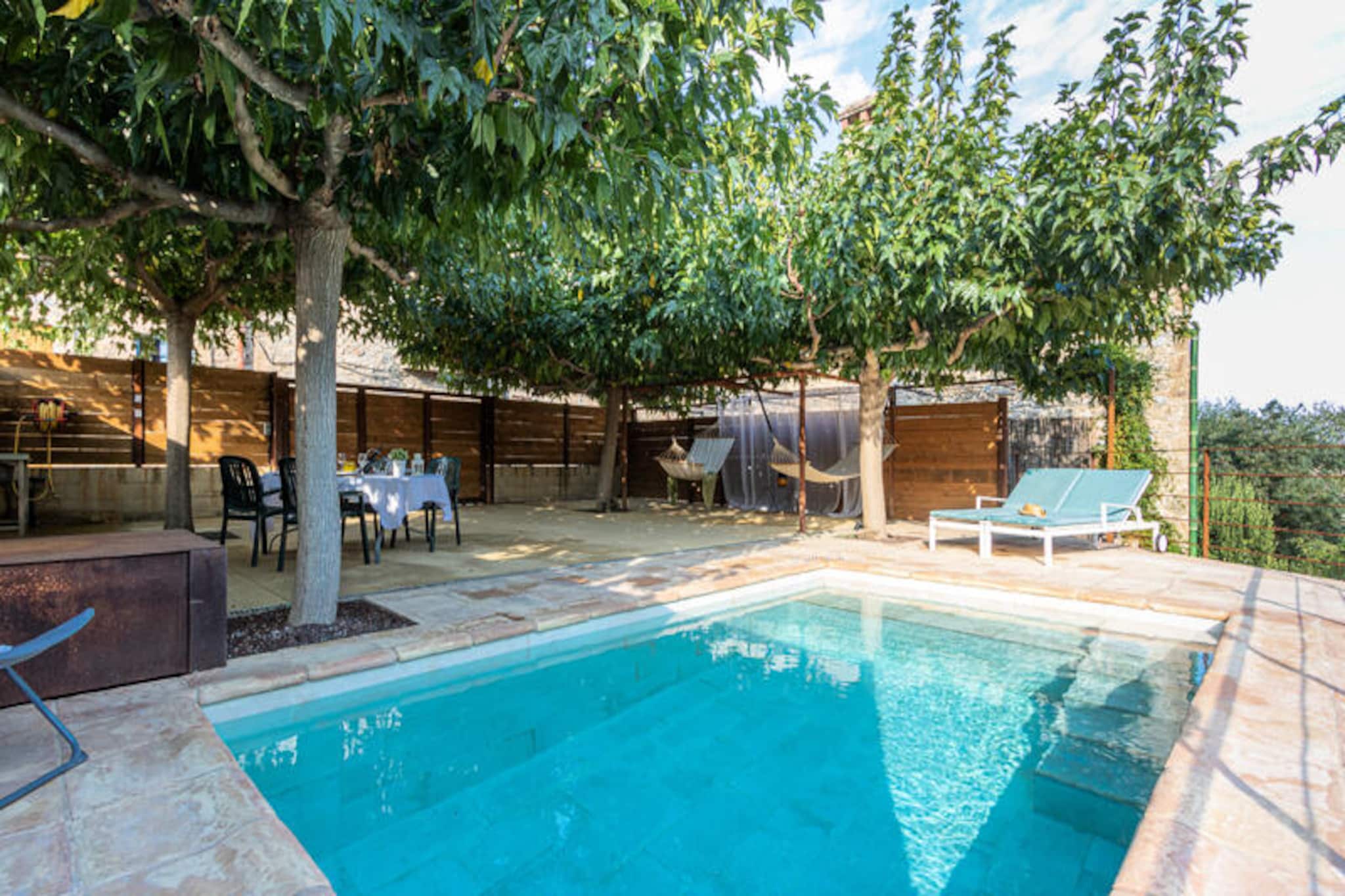 Amid the serene charm of Les Escaules, a quaint village with just 100 residents, Cal Sabater offers a tranquil escape for those seeking peace and relaxation. This terraced house is perfect for unwinding away from the hustle and bustle, with strict rules ensuring the quiet atmosphere of the village is preserved. Guests over 30 years old will appreciate the calm surroundings, where evenings are spent in harmony with nature and the community. The property’s emphasis on tranquility makes it a haven for families and couples looking to reconnect with simplicity and beauty.
Inside, Cal Sabater accommodates up to eight guests in four elegantly decorated bedrooms across 130 square meters of space. The interiors blend comfort and style, featuring a cozy fireplace, central heating, and air conditioning options to suit every season. Mosquito nets ensure uninterrupted enjoyment of fresh air, while modern amenities such as free Wi-Fi, a fully equipped kitchen, and thoughtful touches like a washing machine and hairdryer cater to every need. The open-plan kitchen is a delight for home cooks, complete with all necessary appliances and utensils for preparing meals to share with loved ones.
Step outside to discover the property’s inviting outdoor spaces. A private pool offers a refreshing retreat during warm summer days, while the enclosed courtyard and garden provide a safe and charming area for families to relax. The 30-square-meter terrace, equipped with garden furniture and a barbecue, is ideal for al fresco dining or quiet afternoons soaking up the sun. For active guests, the ground floor includes secure storage for bicycles and strollers, adding convenience to your stay.
Located near the scenic beauty of Girona province, Cal Sabater is managed by Els Majordoms, a professional holiday accommodation company known for its high standards and excellent guest communication. Whether you’re exploring the nearby countryside or simply enjoying the comforts of this peaceful retreat, Cal Sabater promises an unforgettable holiday experience.