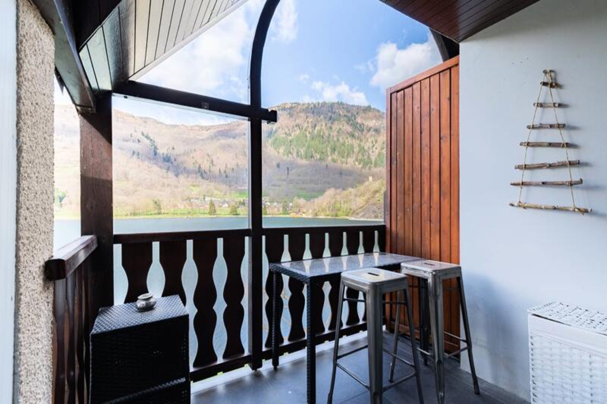 Where the serene waters of Lake Loudenvielle meet the majestic Pyrenees, this charming duplex offers a tranquil retreat for up to six guests. Imagine mornings spent gazing at the shimmering lake from your window, afternoons exploring picturesque trails, and evenings unwinding in the soothing thermal baths of Balnéa, just a five-minute walk away. The property’s peaceful location near the village center ensures both quiet relaxation and convenient access to local attractions. With the Skyvall shuttle only 100 meters away, you’re perfectly positioned to enjoy the best of the region year-round. \n\nInside, the duplex has been thoughtfully renovated to provide modern comfort while maintaining a warm and welcoming atmosphere. The fully equipped kitchen opens onto a cozy living room, ideal for sharing meals and moments with loved ones. Two bedrooms feature plush double beds (140 cm and 160 cm), while a third offers twin beds (90 cm), making it perfect for families or groups of friends. Additional amenities include free Wi-Fi via a 5G Home Box, a TV for entertainment, and a washing machine for convenience. A private parking space adds to the ease of your stay.\n\nStep outside and you’ll find yourself immersed in the natural beauty of Loudenvielle. Whether you’re hiking through verdant valleys, cycling along scenic routes, or simply enjoying the lake’s peaceful ambiance, there’s something for everyone here. The nearby Skyvall gondola provides effortless access to Peyragudes ski resort, making this property a perfect base for winter sports enthusiasts. \n\nWhether you’re seeking adventure or relaxation, this duplex offers an unforgettable escape in the heart of the Pyrenees. Let the stunning landscapes and warm hospitality of Loudenvielle create memories that will last a lifetime.