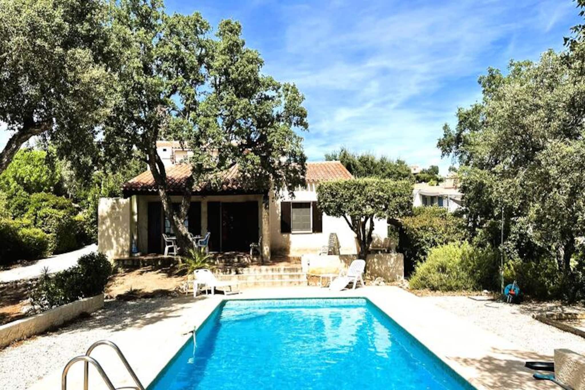 Amidst the serene beauty of the Massif des Maures, Villa Le Plantier offers a tranquil escape surrounded by lush pine and oak trees. This private retreat, located in the prestigious Domaine de Valcros, is just moments away from an 18-hole international golf course and the stunning beaches of the Var coastline. From the turquoise waters of Porquerolles Island to the historic Fort de Brégançon, this villa places you at the heart of the region's most captivating attractions. Whether you're seeking relaxation or adventure, this is the perfect setting for unforgettable moments with family or friends.
The villa features an expansive outdoor area, complete with a private garden and a fenced swimming pool, ensuring both privacy and safety. The south-facing terrace offers breathtaking views of the sea, Porquerolles Island, and the Gulf of Giens, making it an idyllic spot for morning coffee or evening sunsets. Inside, the living and dining area seamlessly connect to the terrace, while the fully equipped kitchen provides everything you need for home-cooked meals, including modern appliances and access to a laundry room.
The villa comfortably accommodates up to six guests. On the ground floor, two bedrooms with twin beds and ample storage share a bathroom and separate toilet. Upstairs, the master bedroom boasts a double bed, private terrace access, and an en-suite shower room. For added convenience, the villa includes Wi-Fi, a TV, sun loungers, and private parking for multiple vehicles.
Explore the nearby golden beaches, hike through the scenic trails of Cap Bénat, or indulge in the local cuisine at charming seaside restaurants. With its prime location and luxurious amenities, Villa Le Plantier promises a holiday filled with relaxation, natural beauty, and cherished memories.