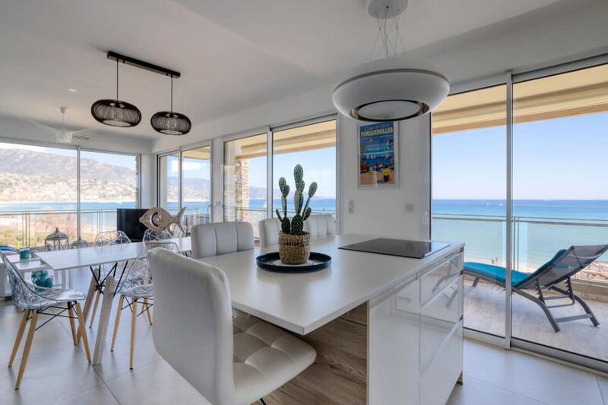 Imagine waking up to the gentle sound of waves and stepping out onto your expansive terrace to take in the breathtaking sea views. This stunning 90m² apartment, located just behind the golden sands of Anglade Beach in Le Lavandou, offers the perfect seaside escape. With direct beach access and a modern, stylish design, this property is a haven for those seeking both relaxation and adventure on the French Riviera.
Inside, every detail has been carefully curated for your comfort. The apartment boasts two spacious bathrooms, air conditioning, and a fully equipped kitchen, ensuring a stress-free stay. The bright and airy living spaces are complemented by contemporary decor, while the large terrace provides the ideal spot for al fresco dining or simply soaking up the Mediterranean sun. With Wi-Fi, a washing machine, and two reserved parking spaces in a secure residence, all your needs are met for a seamless holiday experience.
Step outside, and you’ll find yourself just moments from the vibrant heart of Le Lavandou, with its charming shops, restaurants, and local markets. The residence, Thalassa, is perfectly situated between the town center and the lively La Favière district, offering a balance of tranquility and accessibility. Whether you’re strolling along the beach, exploring nearby coastal trails, or indulging in Provençal cuisine, the location ensures endless opportunities for discovery.
Managed by the dedicated team at Conciergerie Suzette, your stay is guaranteed to be exceptional. From personalized welcomes to 24/7 support, every aspect of your holiday is handled with care and professionalism. This is more than just a vacation rental—it’s your gateway to unforgettable moments by the sea.