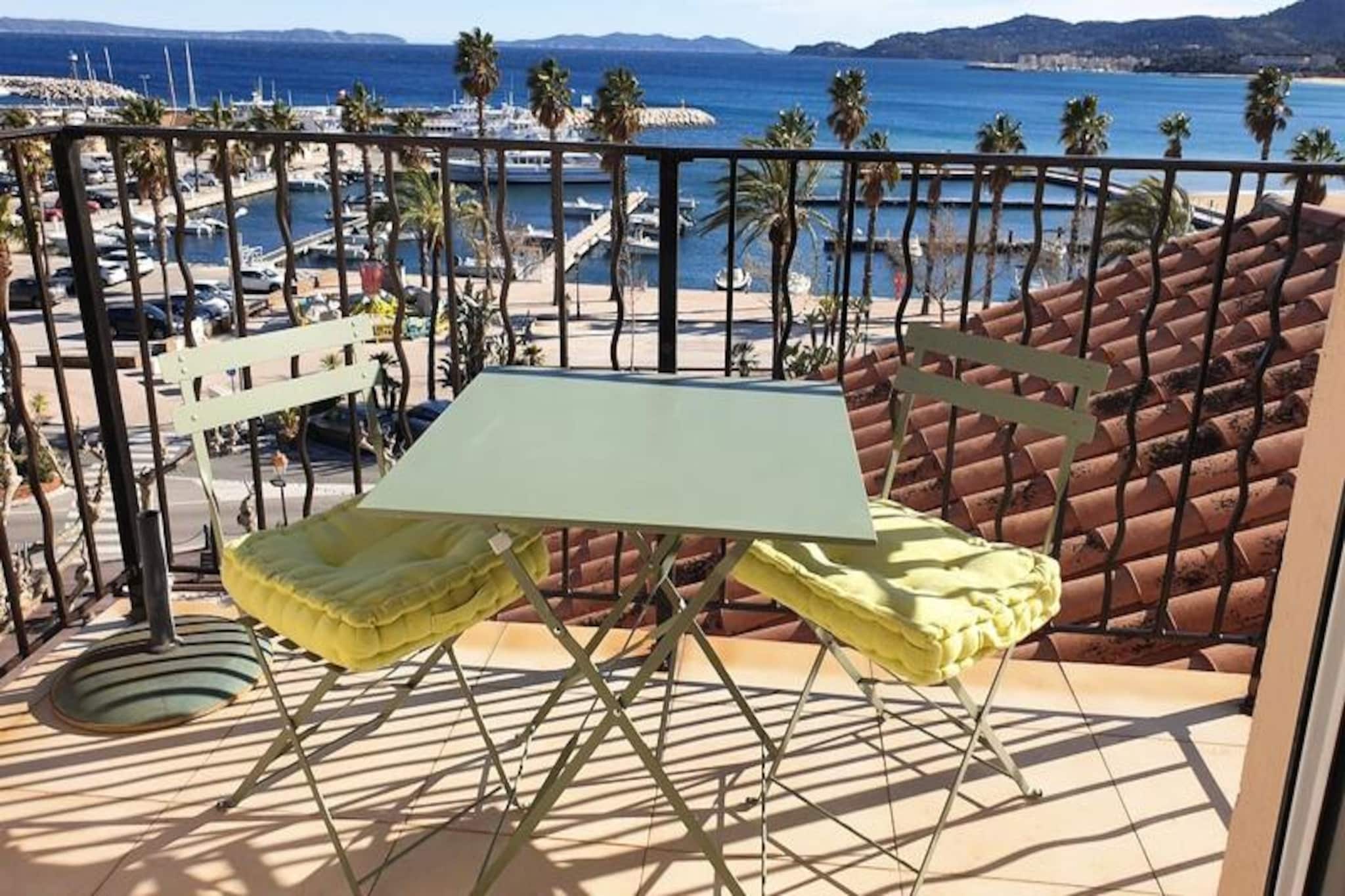 Awaken your senses to the charm of the French Riviera in this stunning one-bedroom apartment, perched in the heart of Le Lavandou. Just 100 meters from the bustling port and a mere 200 meters from the golden sands of the main beach, this south-facing retreat offers a panoramic 180° view of the azure Mediterranean and the enchanting Golden Islands. Whether you're sipping coffee on the terrace or soaking in the sea breeze, every moment here feels like a postcard come to life.
Step inside to discover a space that blends elegance with comfort. Rated 4**** for its exceptional amenities, the apartment features a bright living room and a cozy bedroom, both with mesmerizing sea views. The open-plan kitchen is fully equipped with modern appliances, including a 3-burner induction hob, capsule coffee maker, and blender, making it perfect for preparing fresh local delicacies. The bathroom boasts a sleek walk-in shower, while reversible air conditioning ensures year-round comfort. The 4.50m² terrace, complete with garden furniture and electric shutters, invites you to unwind in style. Additional touches like Wi-Fi, a flat-screen TV, a smart speaker, and a concierge service elevate your stay to pure luxury.
Outside your door, the vibrant pedestrian streets of Le Lavandou await, lined with bakeries, supermarkets, and charming restaurants. The nearby family-friendly beach, shaded by palm trees and overlooking the Levant and Port-Cros islands, offers activities for all ages, from paddleboarding to sailing. For those seeking adventure, diving clubs and water sports rentals are just steps away.
Whether you're here for the sun-soaked beaches, the lively port, or the serene island views, this apartment is your perfect gateway to the magic of the Côte d'Azur. With every detail thoughtfully curated, it promises an unforgettable escape by the sea.